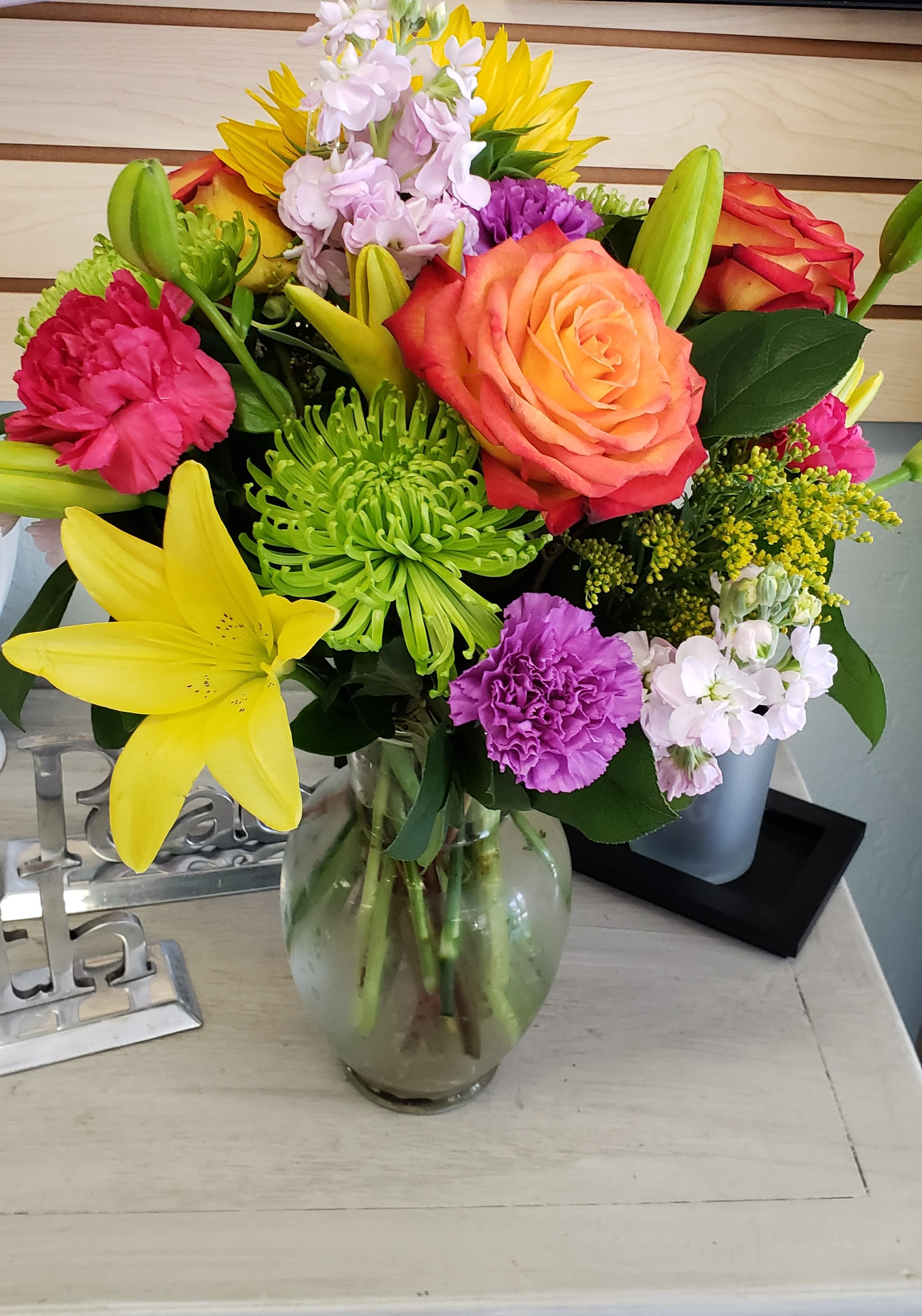 SUMMER FUN SUMMER FUN - Send this vibrant bouquet full of bright colored lilies, roses, carnations, stock and spider mums for any occasion.