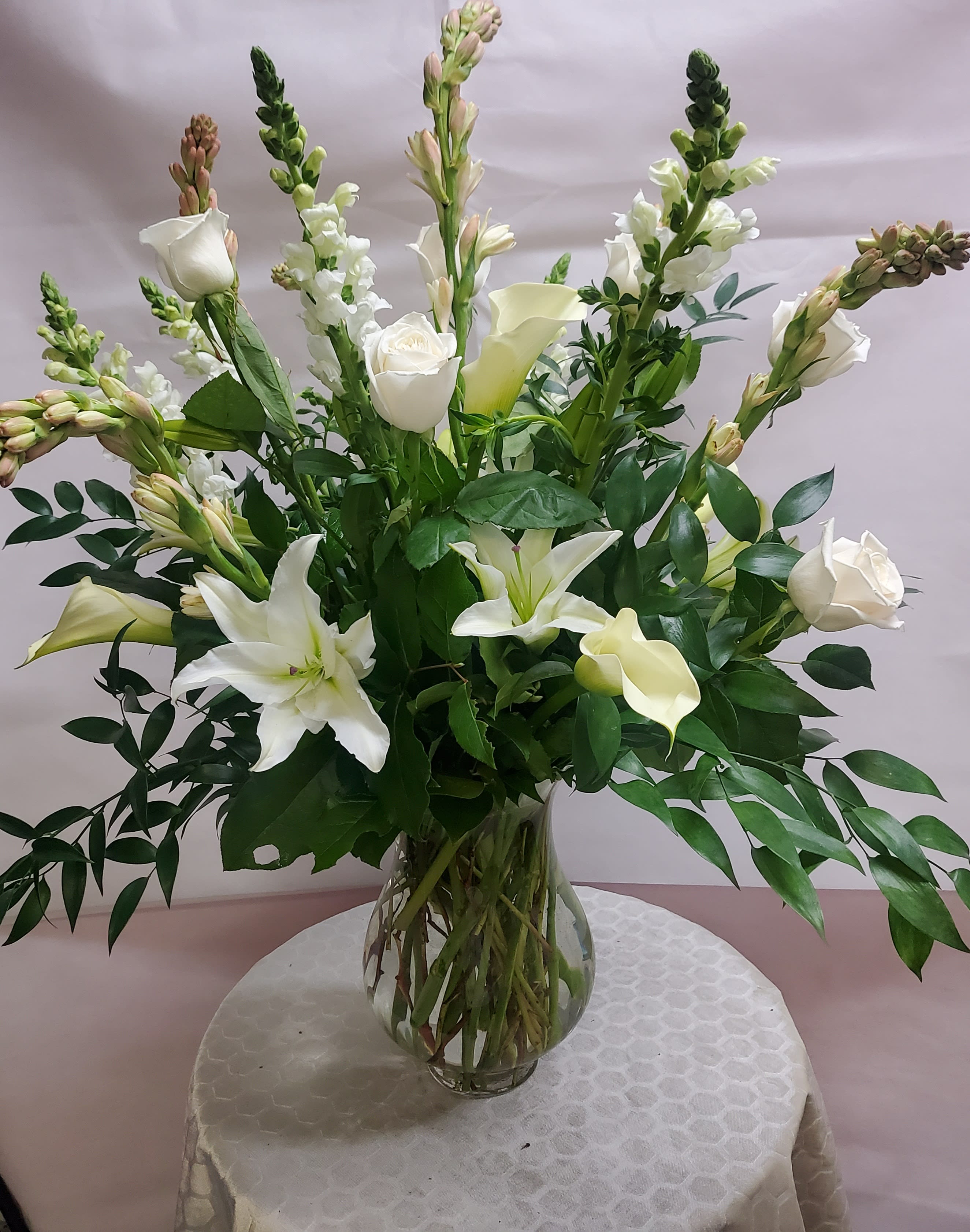 Whimsical Whites - White array of whimsical flowers perfect for Christenings, churches or any occasion. Calla lilies, lilies turbarose 