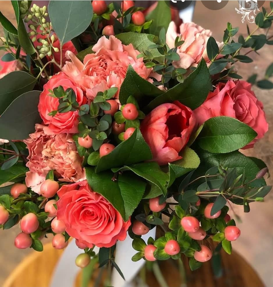 That Arizona Sky That Arizona Sky - Looking for a non traditional Vday bouquet? This is it! A variety of different shades of oranges and peaches with tulips, hypericum berries, carnations, roses and lush greens.