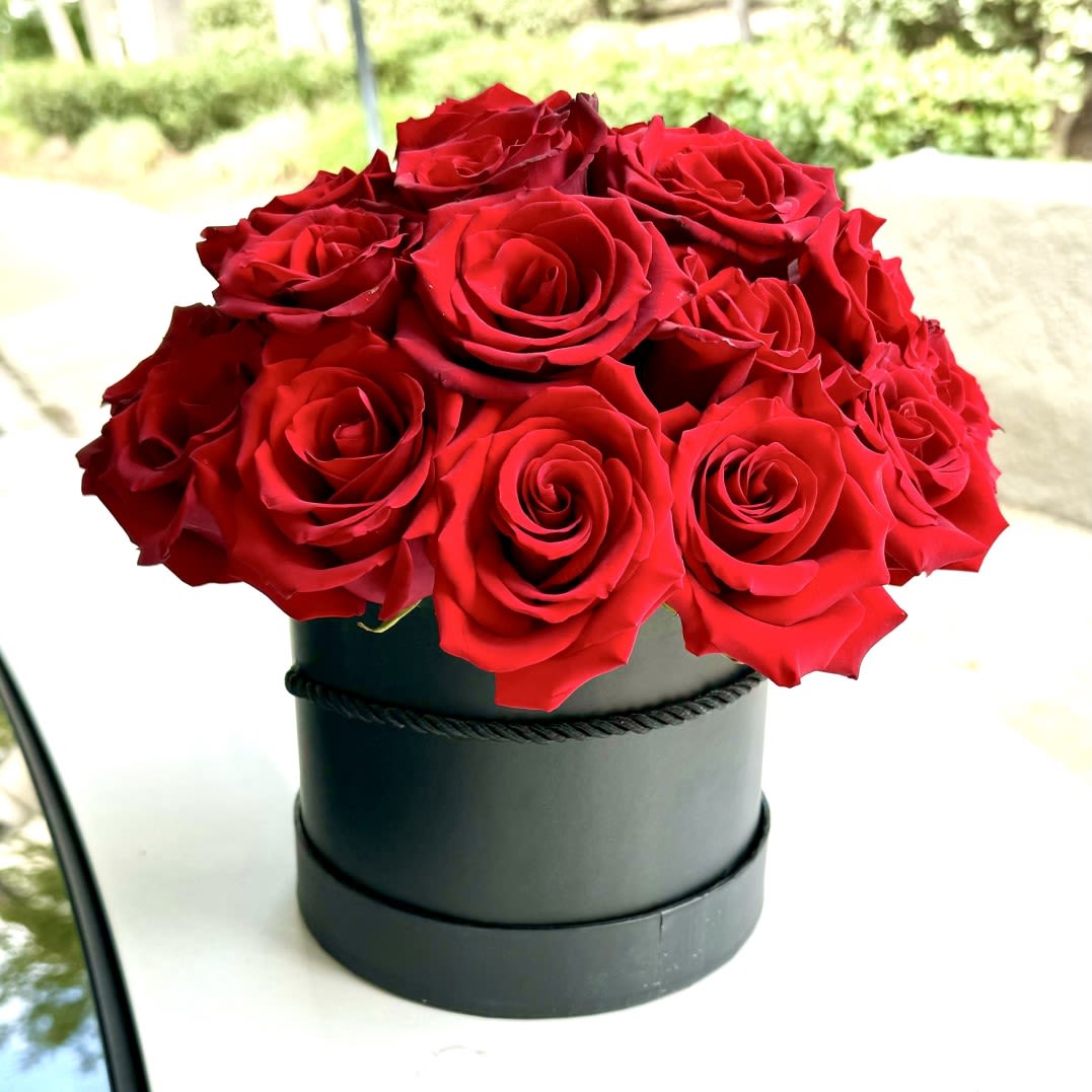 Flowers &quot;Red Roses In a Box&quot; - Our elegant bouquet of red roses in a black box — the perfect gift to express warmth and affection. Compact yet stylish, this rose bouquet is ideal for occasions like birthdays, anniversaries, or simply to brighten someone’s day. Red roses symbolize genuine emotions, while the sleek black box adds a touch of elegance and modernity. Order a bouquet of red roses in a black box with delivery across Los Angeles, and we guarantee fresh flowers and top-quality service. Delight your loved ones with a thoughtful and unique gift!
