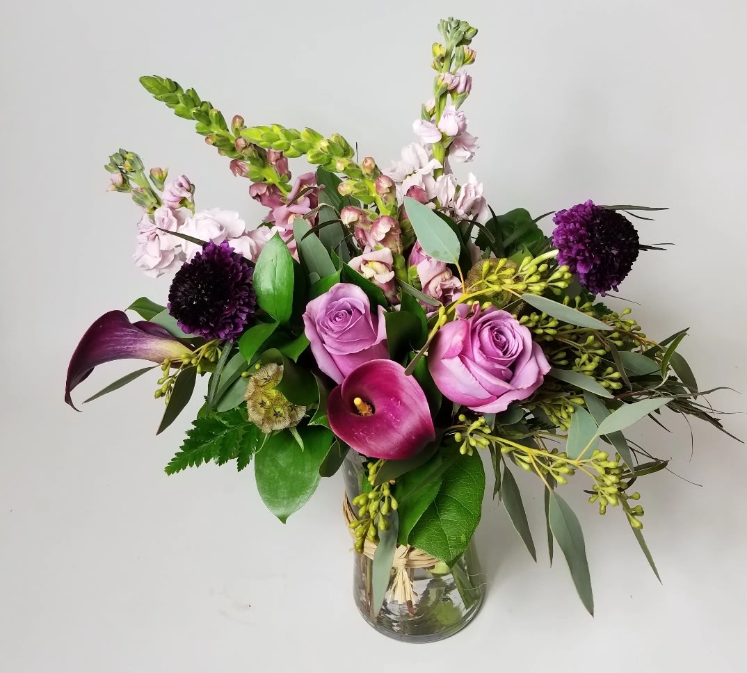 Sassy Sassy - Beautifully designed vibrant purple calla lilies, deep purple scabiosa, and lavender snapdragons. Perfect for any occasion whether you're saying thank you or just because!