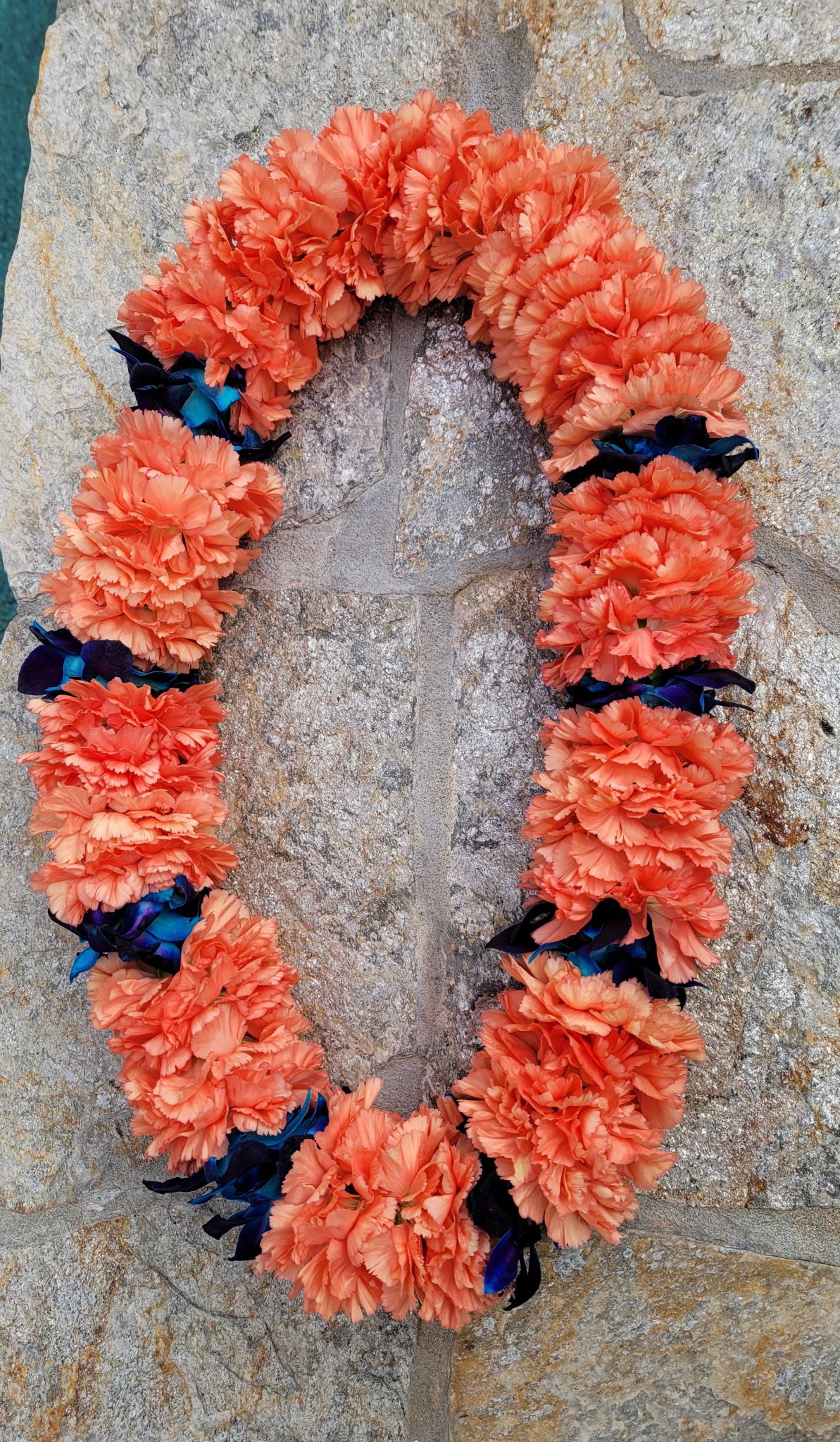 'Elua Kala Lei  - SPECIAL LEI ORDER INSTRUCTIONS: FOR OPTION TO PICK UP YOUR ORDER, PLEASE CALL OR TEXT 858-598-3844  IF ORDERING FROM THE WEBSITE, PLEASE LET US KNOW YOUR COLOR PREFERENCE UNDER NOTES FOR THE FLORIST  When you give someone a Hawaiian lei, it is a heartfelt gift of love, friendship, appreciation, accomplishments, honor, and respect. Great for birthday celebrations, graduations, anniversaries, weddings, special events, funerals, paddle outs, promotions, etc. Made with Aloha. Leis can be custom made with many different color options. For custom made orders please text or call 858-598-3844  Leis Substitution Policy In some instances, our photo may represent an overall theme or look and include a one-of-a-kind which cannot be exactly replicated. Although the actual lei may not precisely match the photo, its temperament will. Occasionally, substitutions of flowers happen due to weather, seasonality and market conditions which may affect availability. If this is the case with the lei you've selected, we will ensure that the style, theme and color scheme of your arrangement is preserved and will only substitute items of equal value or higher value. If any design elements are of major importance to your order, please include them in the florist instructions at checkout or contact us to ensure availability