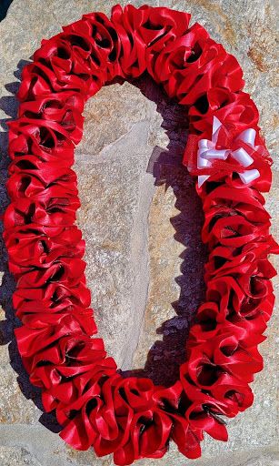 Satin Lei O Nani   - SPECIAL LEI ORDER INSTRUCTIONS: FOR OPTION TO PICK UP YOUR ORDER, PLEASE CALL OR TEXT 858-598-3844  IF ORDERING FROM THE WEBSITE, PLEASE LET US KNOW YOUR COLOR PREFERENCE UNDER NOTES FOR THE FLORIST  When you give someone a Hawaiian lei, it is a heartfelt gift of love, friendship, appreciation, accomplishments, honor, and respect. Great for birthday celebrations, graduations, anniversaries, weddings, special events, funerals, paddle outs, promotions, etc. Made with Aloha. Leis can be custom made with many different color options. For custom made orders please text or call 858-598-3844  Leis Substitution Policy In some instances, our photo may represent an overall theme or look and include a one-of-a-kind which cannot be exactly replicated. Although the actual lei may not precisely match the photo, its temperament will. Occasionally, substitutions of flowers happen due to weather, seasonality and market conditions which may affect availability. If this is the case with the lei you've selected, we will ensure that the style, theme and color scheme of your arrangement is preserved and will only substitute items of equal value or higher value. If any design elements are of major importance to your order, please include them in the florist instructions at checkout or contact us to ensure availability  