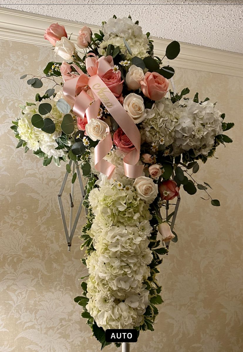 Home At Last Home At Last - A beautiful cross created with with hydrangea with a pink, peach and orange overlay