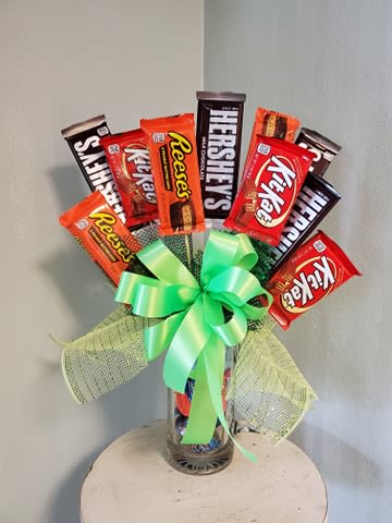 Candy Surprise Candy Surprise - It's has 10 pieces of candy on top and a bottom filled with smaller candy, please put in special instructions if you want chocolate, hard candy, or a mix of both. You can also add a balloon or/and a bear for the upgraded price.