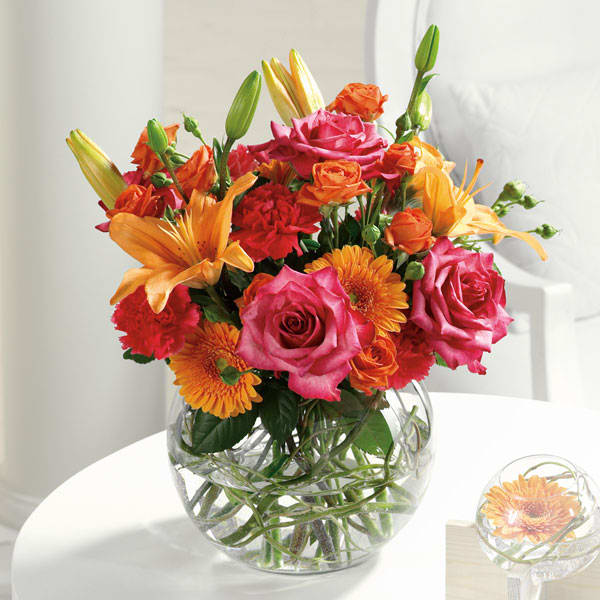 Bowl Of Beauty Bowl Of Beauty - Stunning roses, Gerbera daisies, lilies and carnations make a dazzling impression!