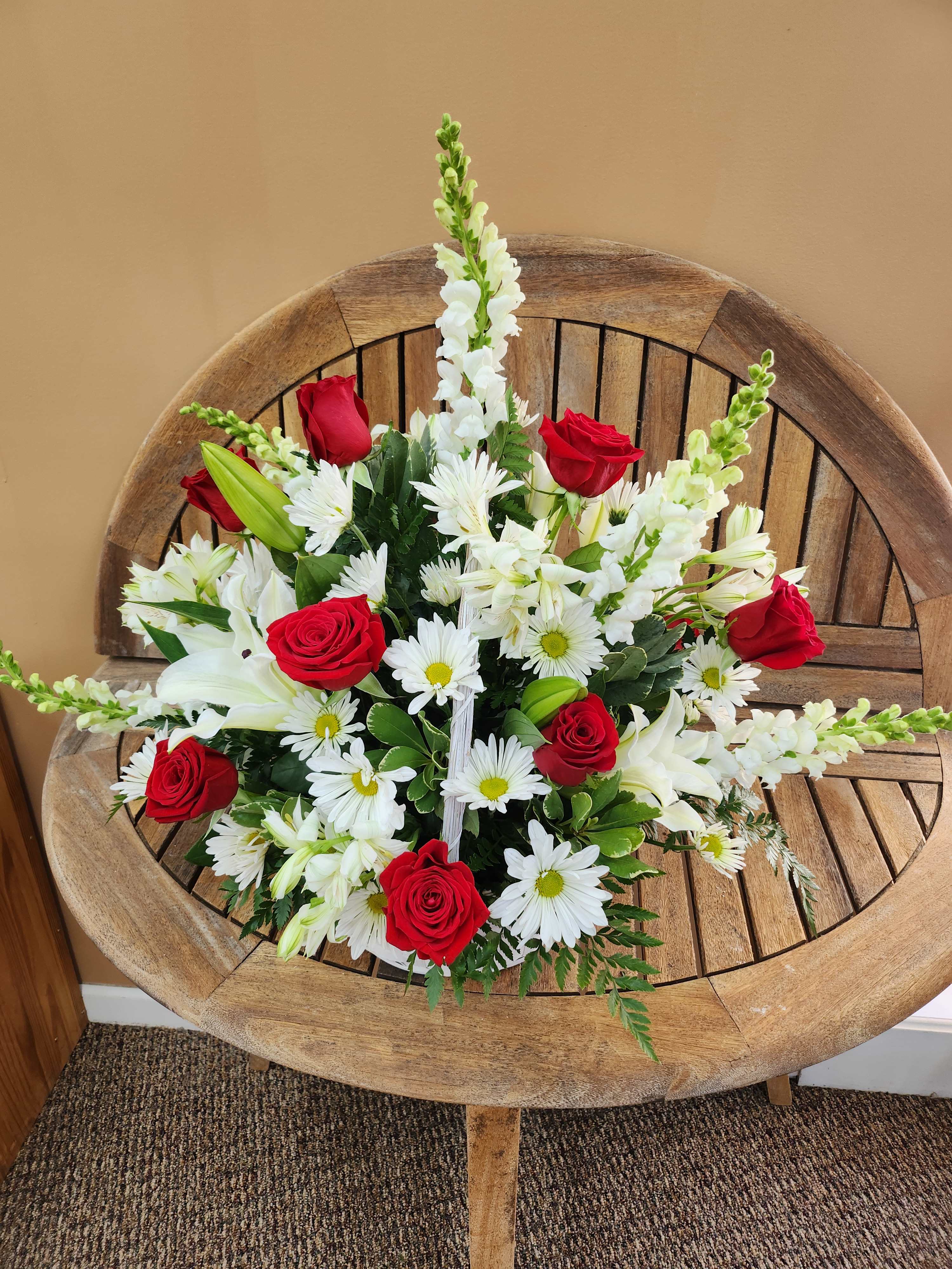 Lovely Red And White Arrangement  - Mixture of red and white flowers in a basket.