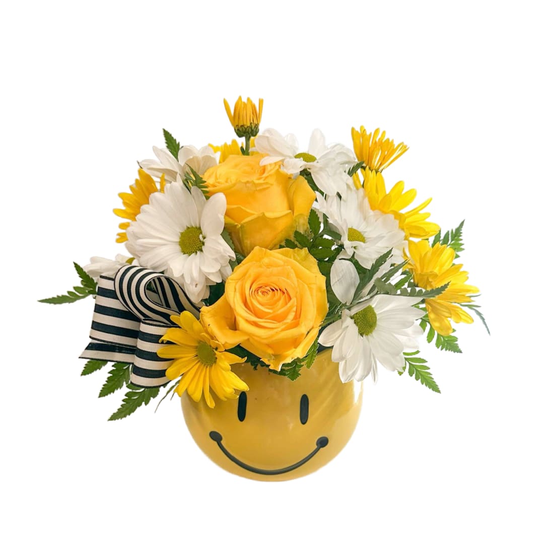 Be Happy Be Happy - This smile arrangement is full of yellow and white blooms with out signature ribbon!