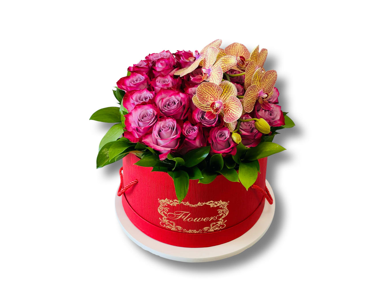 Jovi Joy - Delicate and elegant this beautiful floral box arrangement, using deep purple roses with orchids in a delicate round box. Send this lovely arrangement of flowers today.   