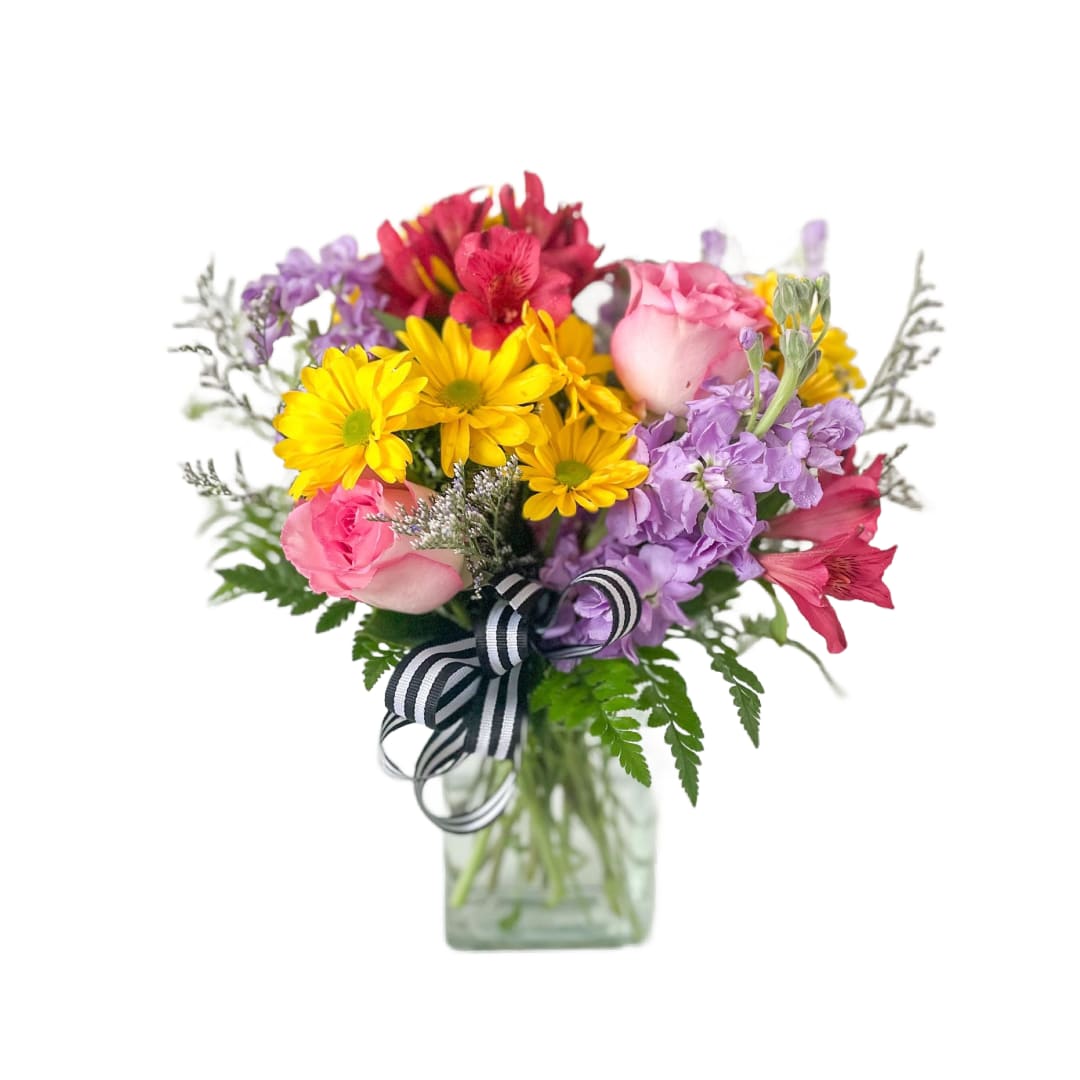 Spring Time - Spring Time bring all the seasonal blooms!  Please note that colors and vase may vary. 