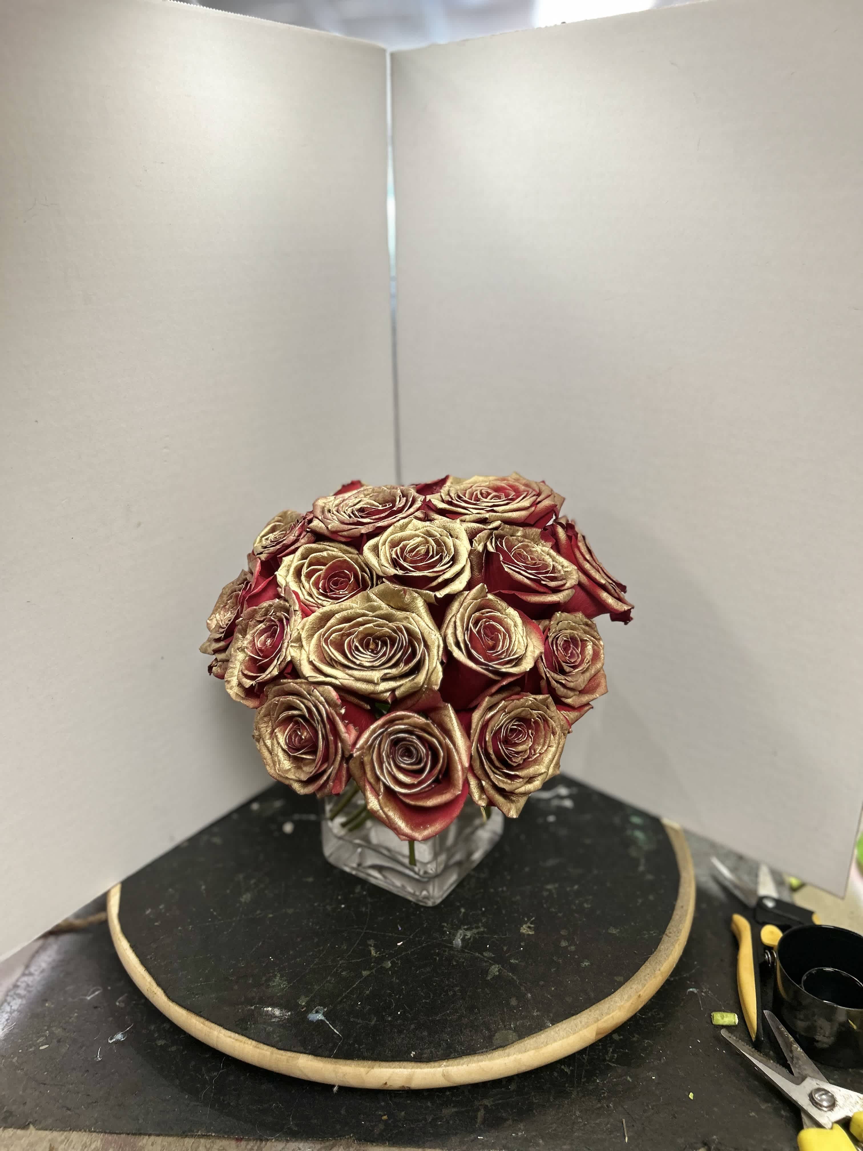Princess Treatment - 16 red and gold roses made to show your love.