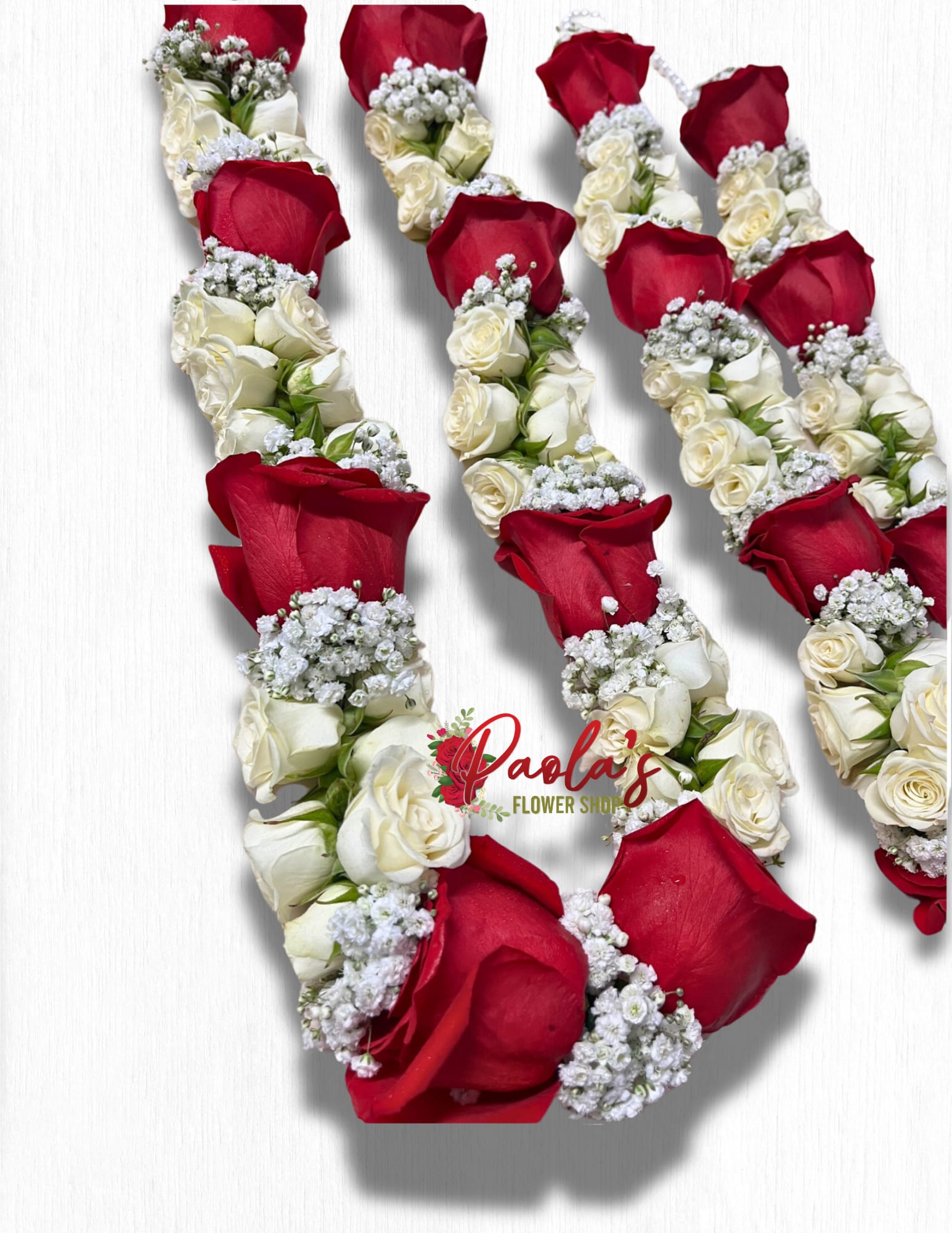 Rose Lei - (1) garland measuring approximately 26&quot; in length Please place orders 1 week in advance 