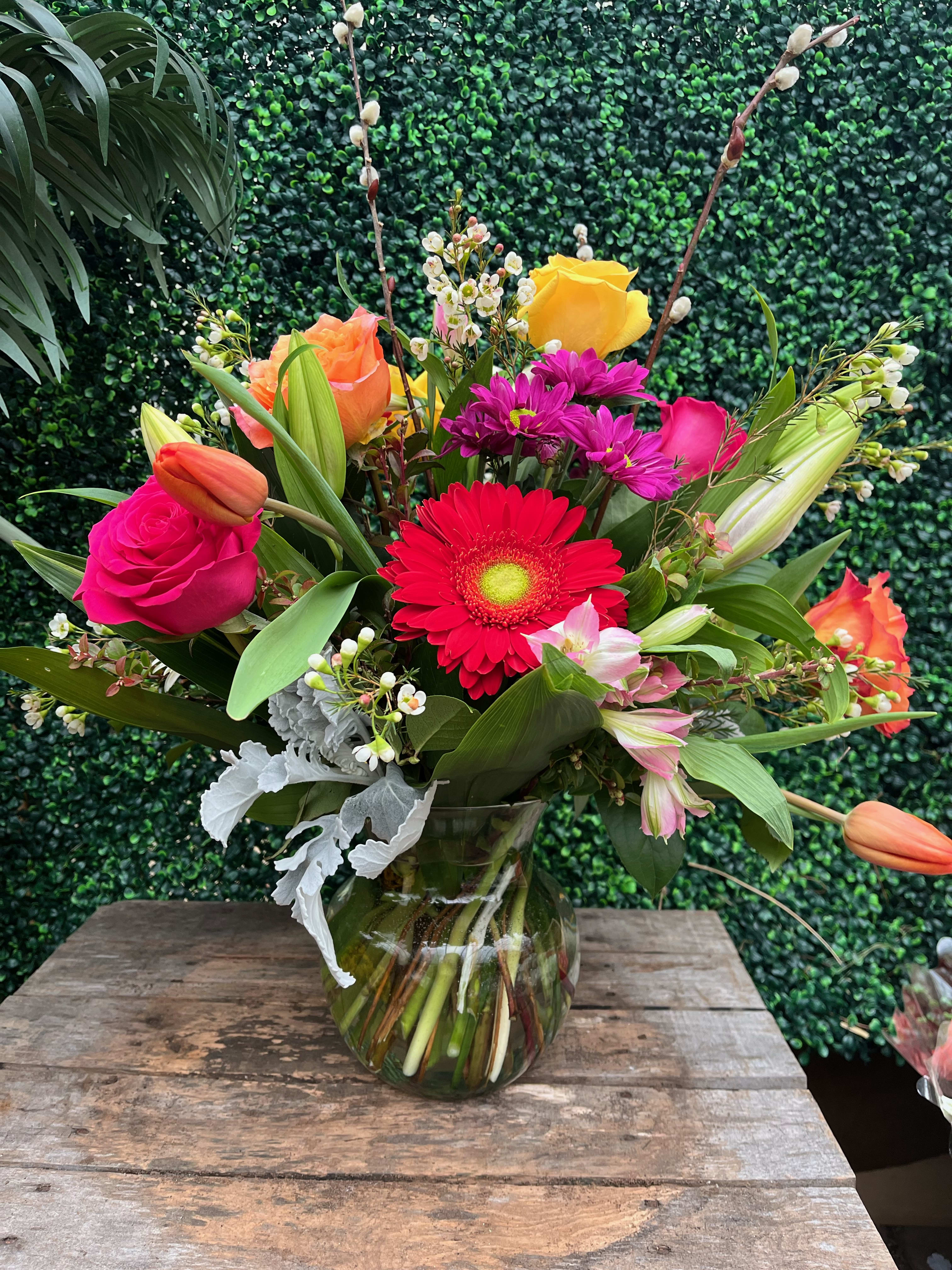 Hello Spring Hello Spring - Welcome Summer with this colorful garden arrangement of spring blooms. * SUBSTITUTIONS MAY BE APPLIED *