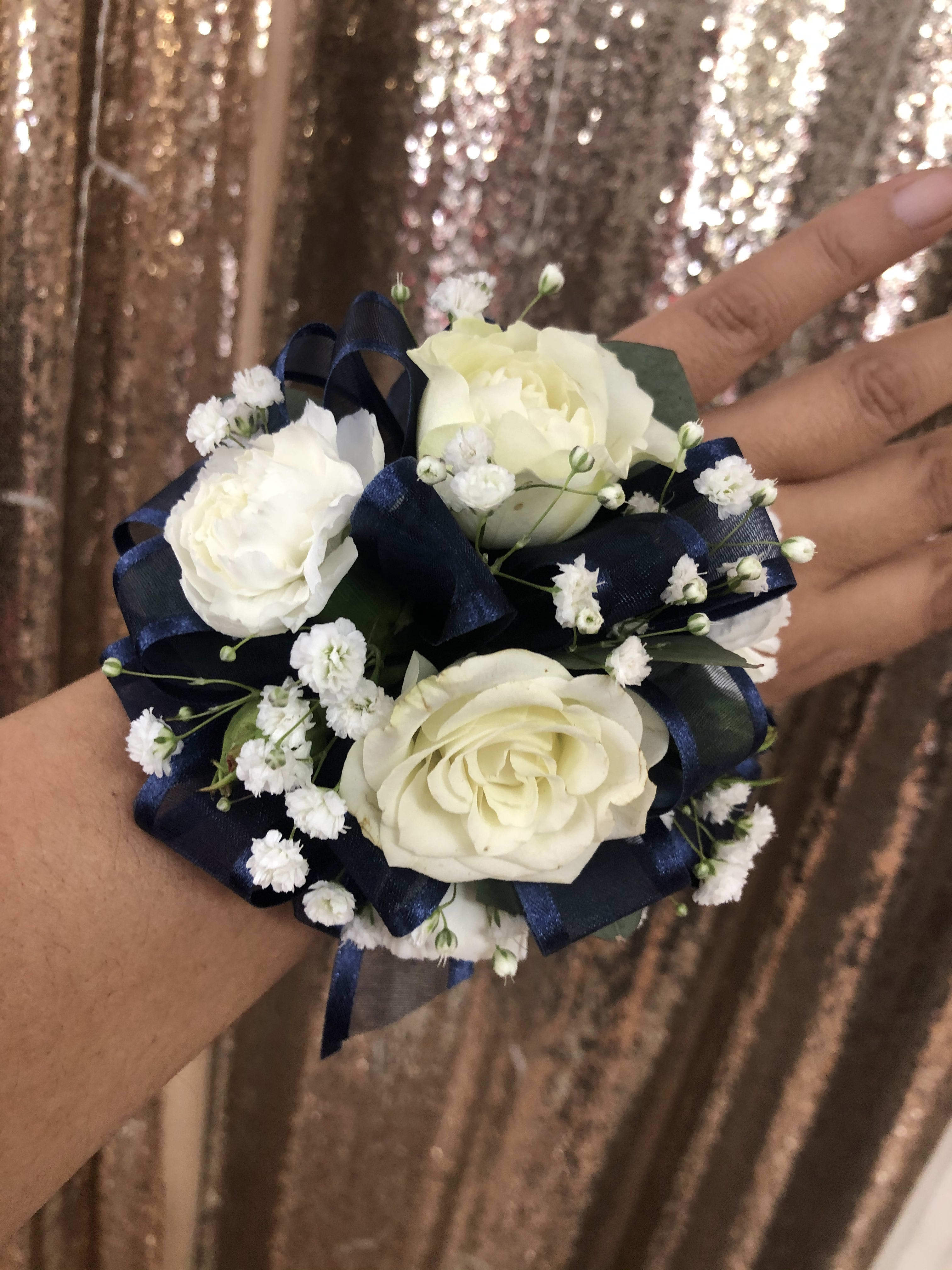 Prom corsages(ADD COLORS IN SPECIAL INSTRUCTIONS) - Made whit spray roses and baby’s breath and fillers JUST INDICATE THE COLOR RIBBON/FLOWER YOU WANT IN SPECIAL INSTRUCTIONS