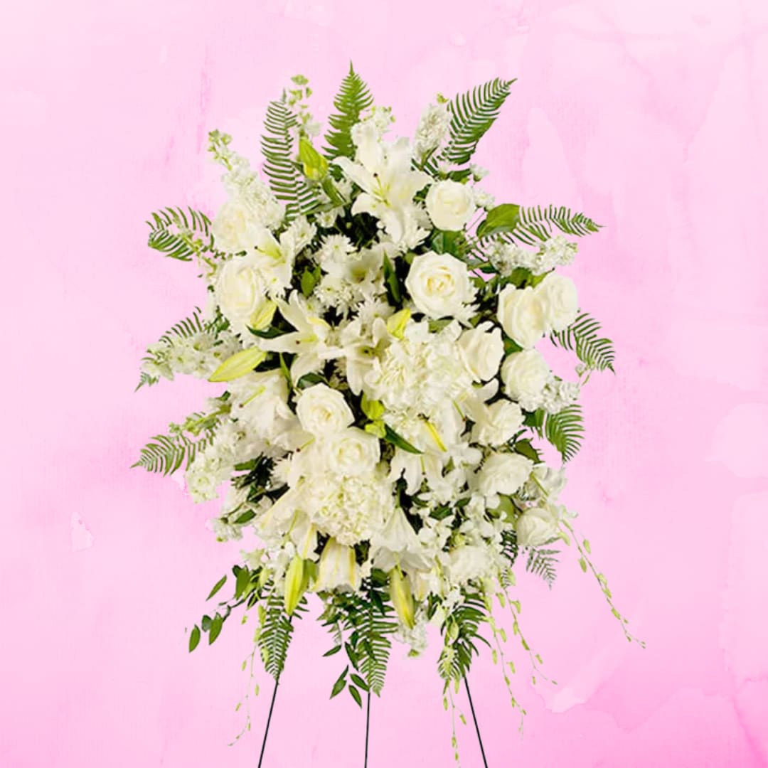 True Sympathy by BloomNation™ True Sympathy by BloomNation™ - An all white tribute, this funeral spray is pure and tranquil. Featuring a variety of white flowers and green palms this elegant funeral spray brings a feeling of peace to it's surroundings
