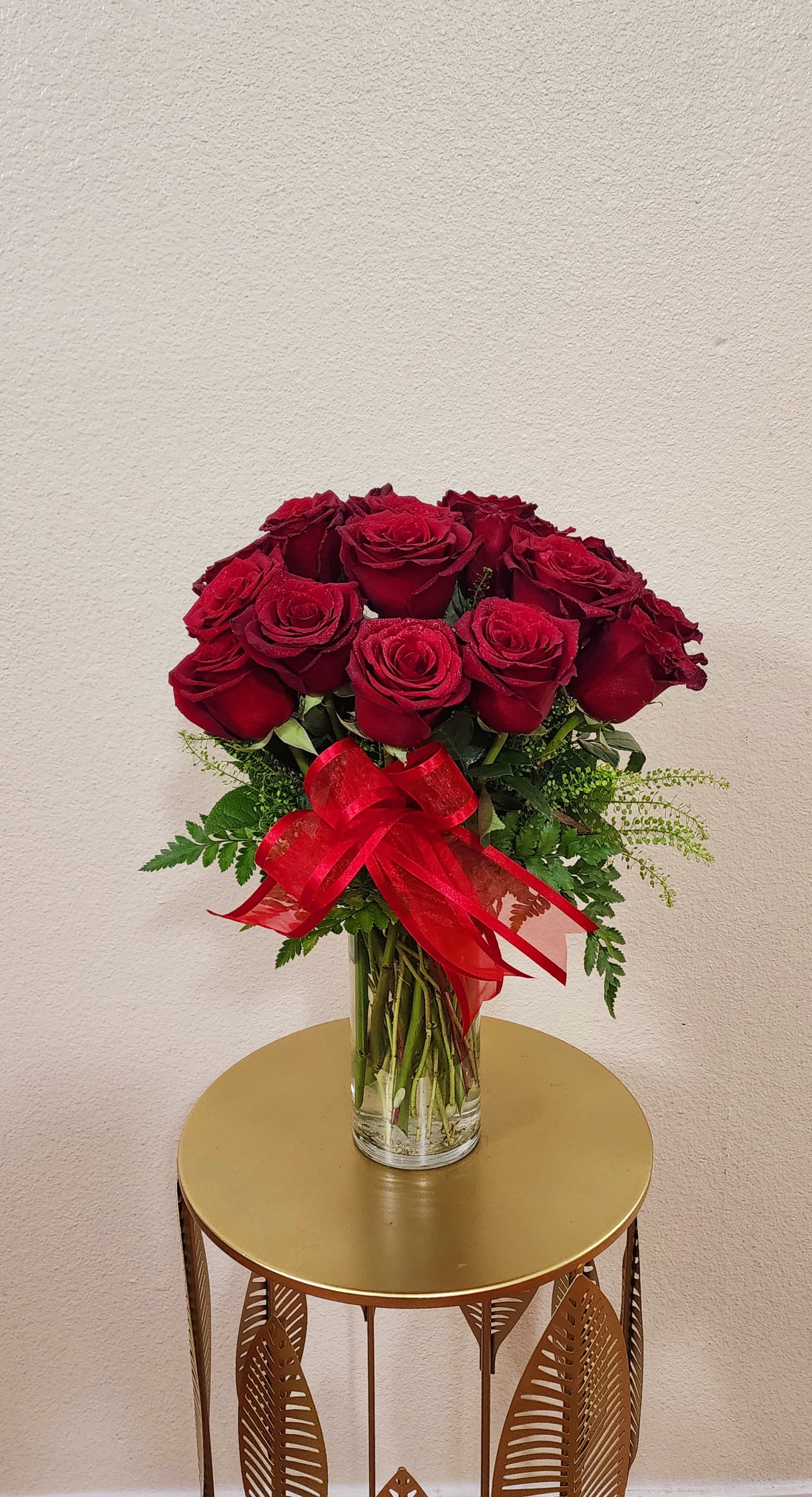 Bright Red - 18 premium Ecuadorian roses with a bright red ribbon on it.