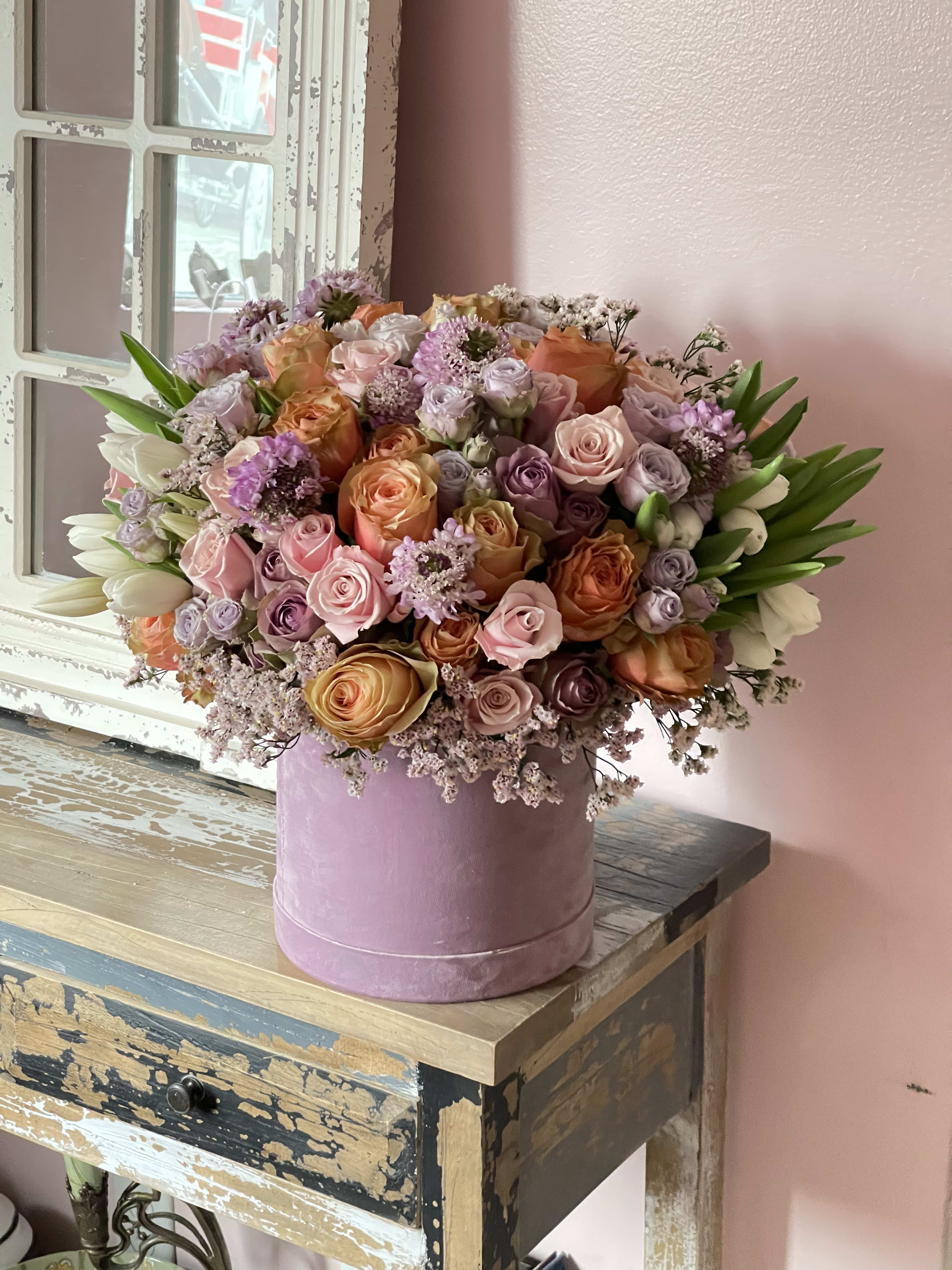 My Muse My Muse - A delightful mixture of florals incorporating different shades of roses, tulips and scabiosas in a beautiful dusty pink box.