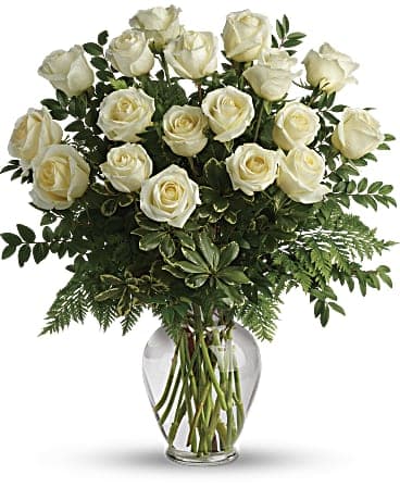 Roses 7 Roses 7 - Two dozen white roses with Greenery and filler flower in a glass vase