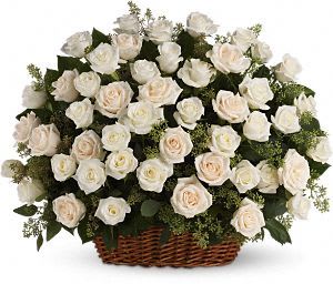 Bountiful Rose Basket Bountiful Rose Basket - The everlasting beauty of a traditional English garden is evoked with this bountiful basket of radiant white and creme roses. Fresh and peaceful, this lovely arrangement will console and uplift, at home or at the service. White and creme roses, presented with fragrant seeded eucalyptus in a large, rectangular basket. Approximately 25" W x 20 1/2" H.