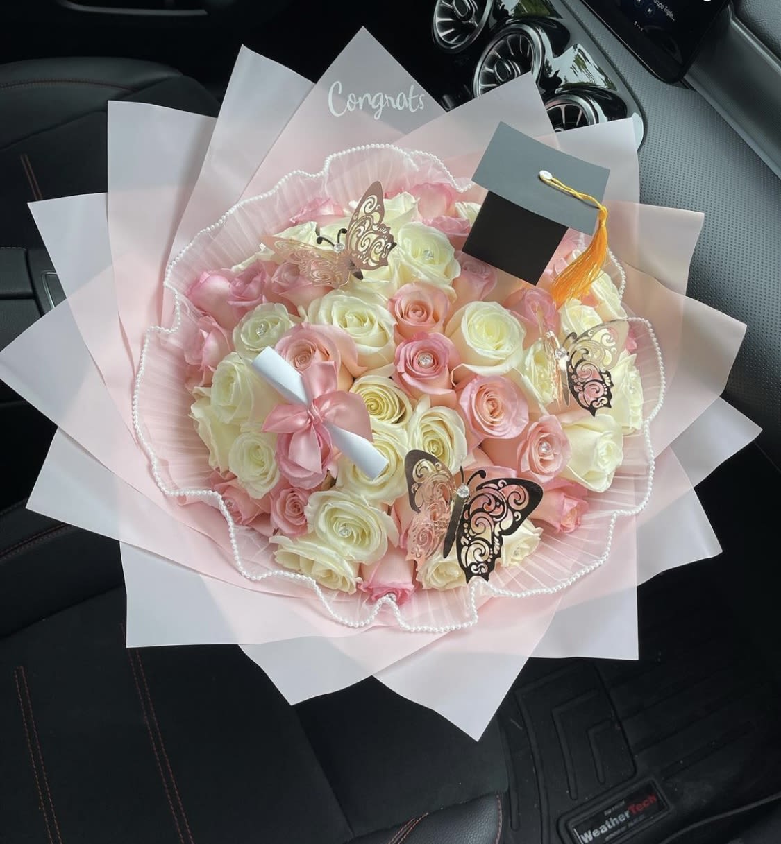 Graduation bouquets  - Precious graduation bouquet with 50 roses in white and pink, pink wrapping 