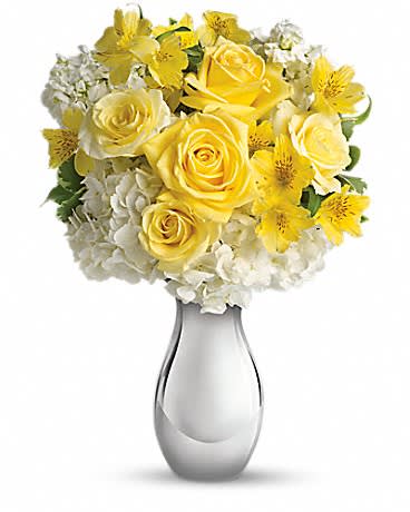 Teleflora's So Pretty Bouquet Teleflora's So Pretty Bouquet - This bouquet is called "So Pretty" because it is s-o-o-o pretty. She'll love the soft yellow roses white hydrangea and other favorites - so artistically arranged in the dazzling Silver Reflections vase. Expect one of her biggest smiles ever.