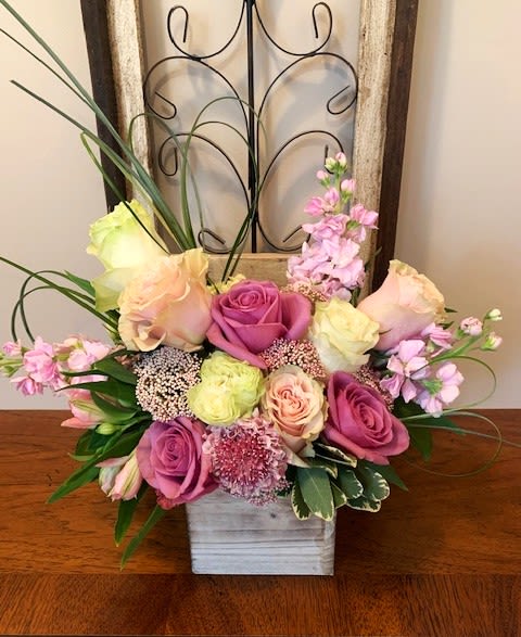 Love You Mom - An elegant arrangement consisting of White, Purple, and Pink Roses, Stock, Alstromeria, Scabiosa, and Rice Flower accented with greenery.