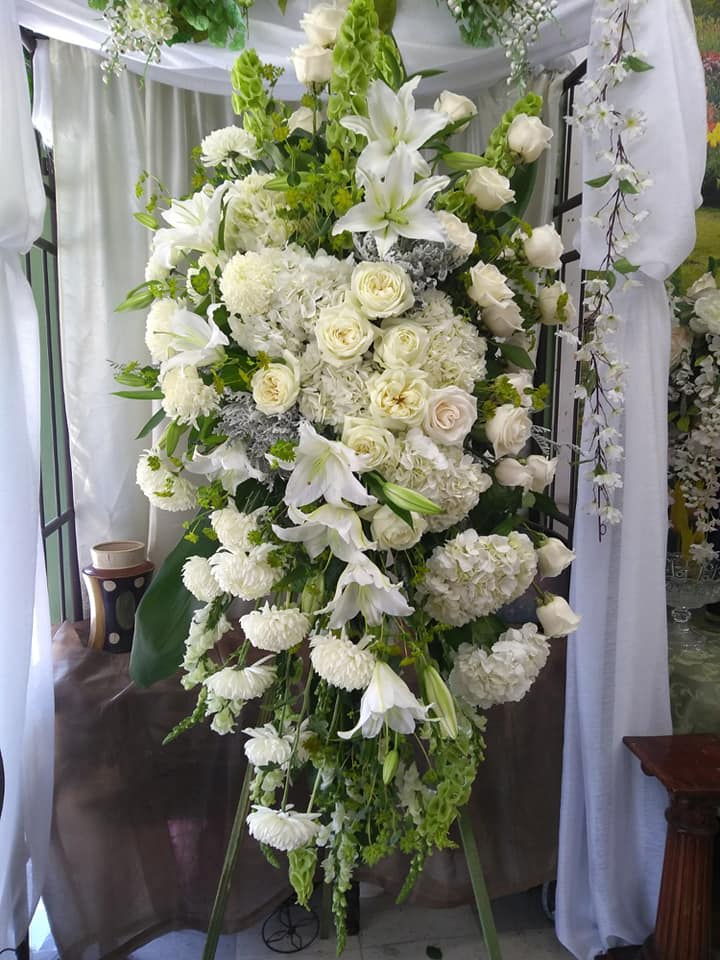 Divine Garden - This lush garden display represents the loving impression they made on you.