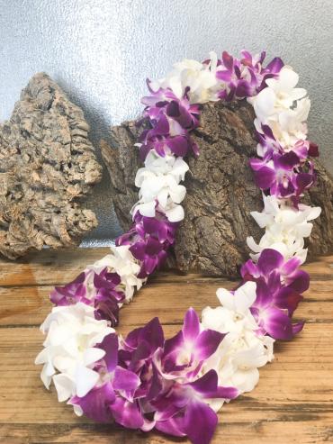 Double Lei Double Lei - NOT available for same-day ordering. Requires minimum 5 day advance notice. Available in purple, or white. Please call the store for available colors.
