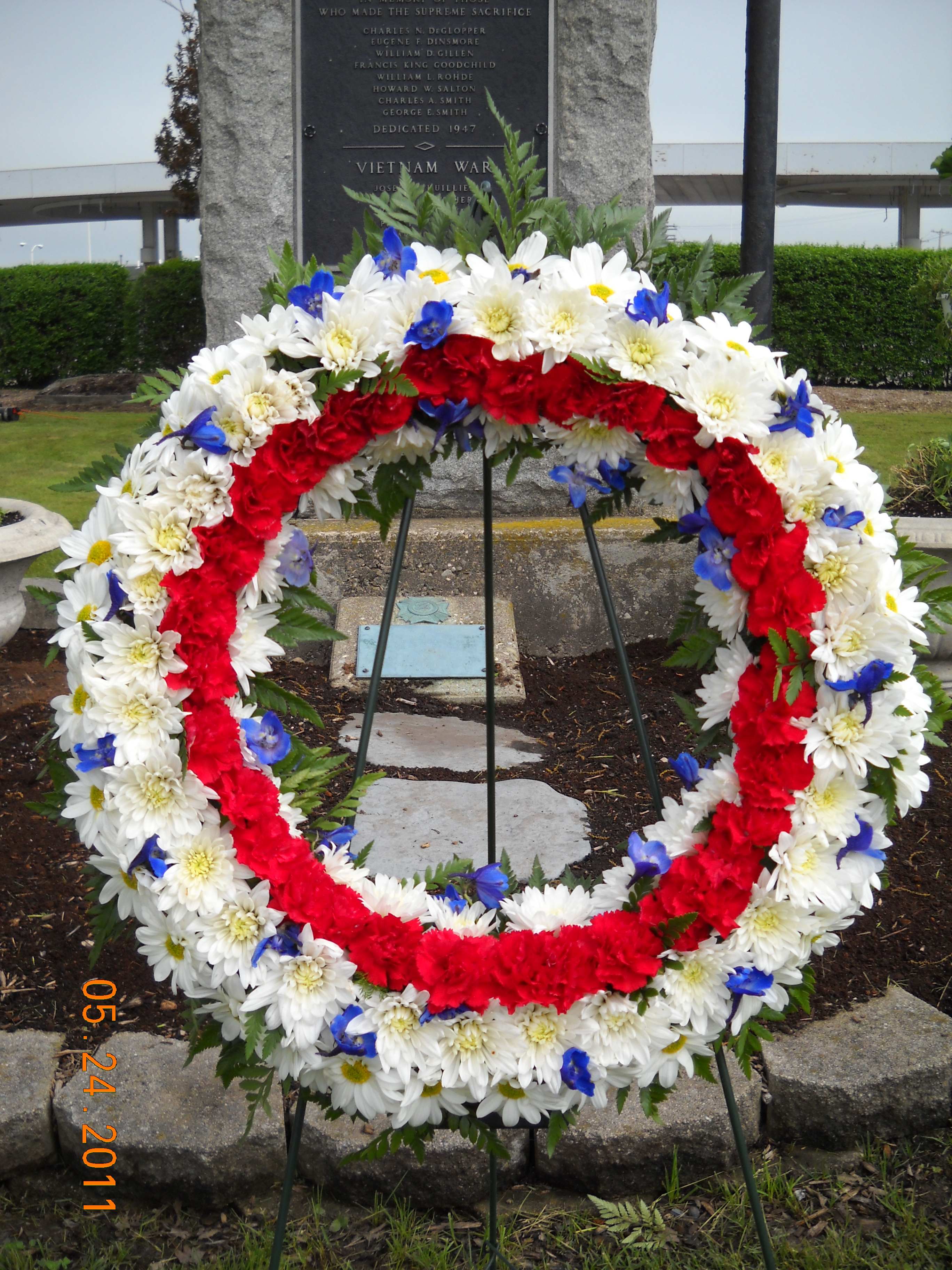 Patriotic Funeral Wreath ~ Flower A Day Patriotic Funeral Wreath ~ Flower A Day - This patriotic funeral wreath features vibrant shades of Red, White, and Blue to honor your loved one and their service.
