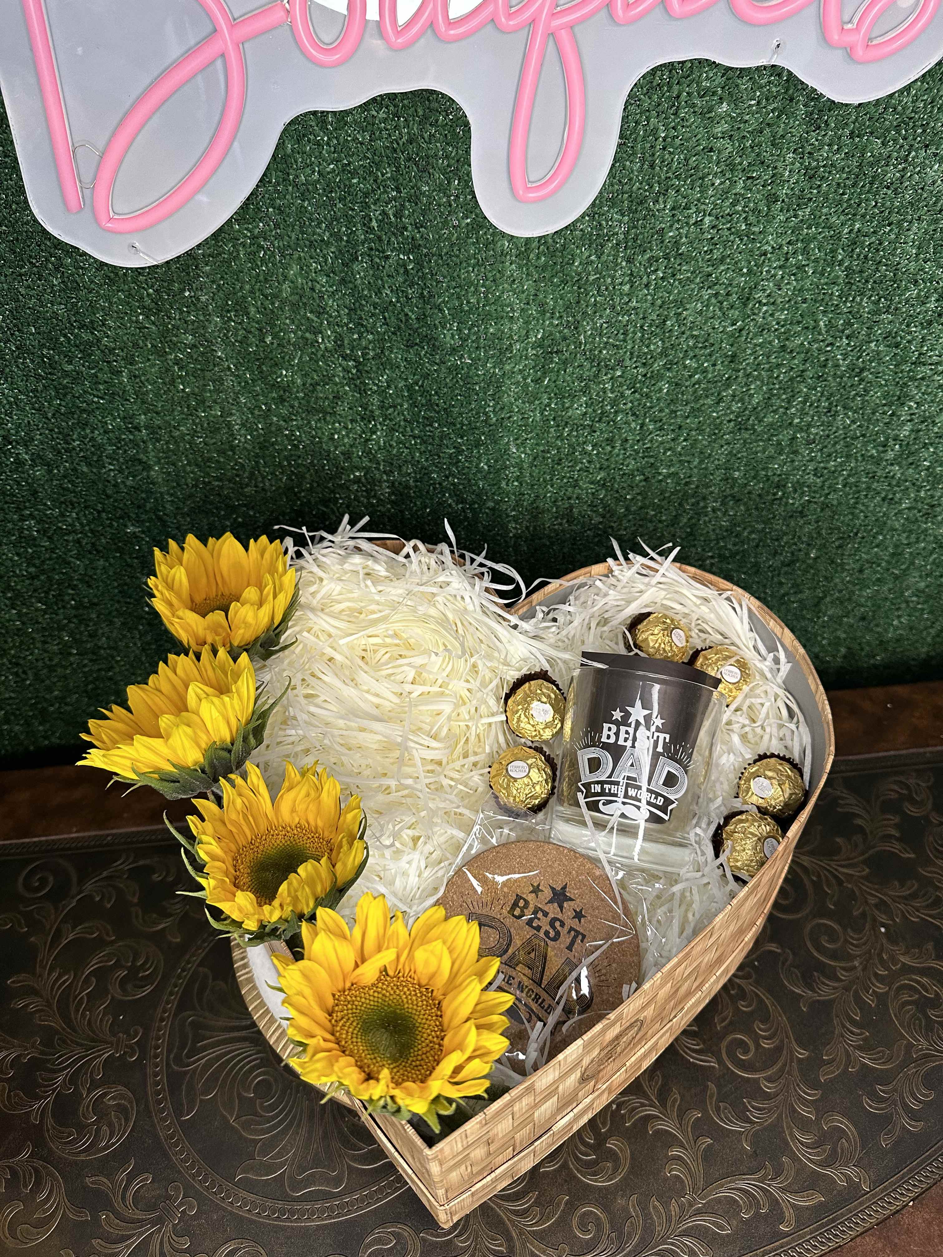 Dad´s Heart Dad´s Heart - Heart shape box includes a whisky glass and chocolates. Space for you to add your gift "Picture is a reference every arrangement would not be exactly the same. Color Substitution may apply. Flowers and color substitution may apply"