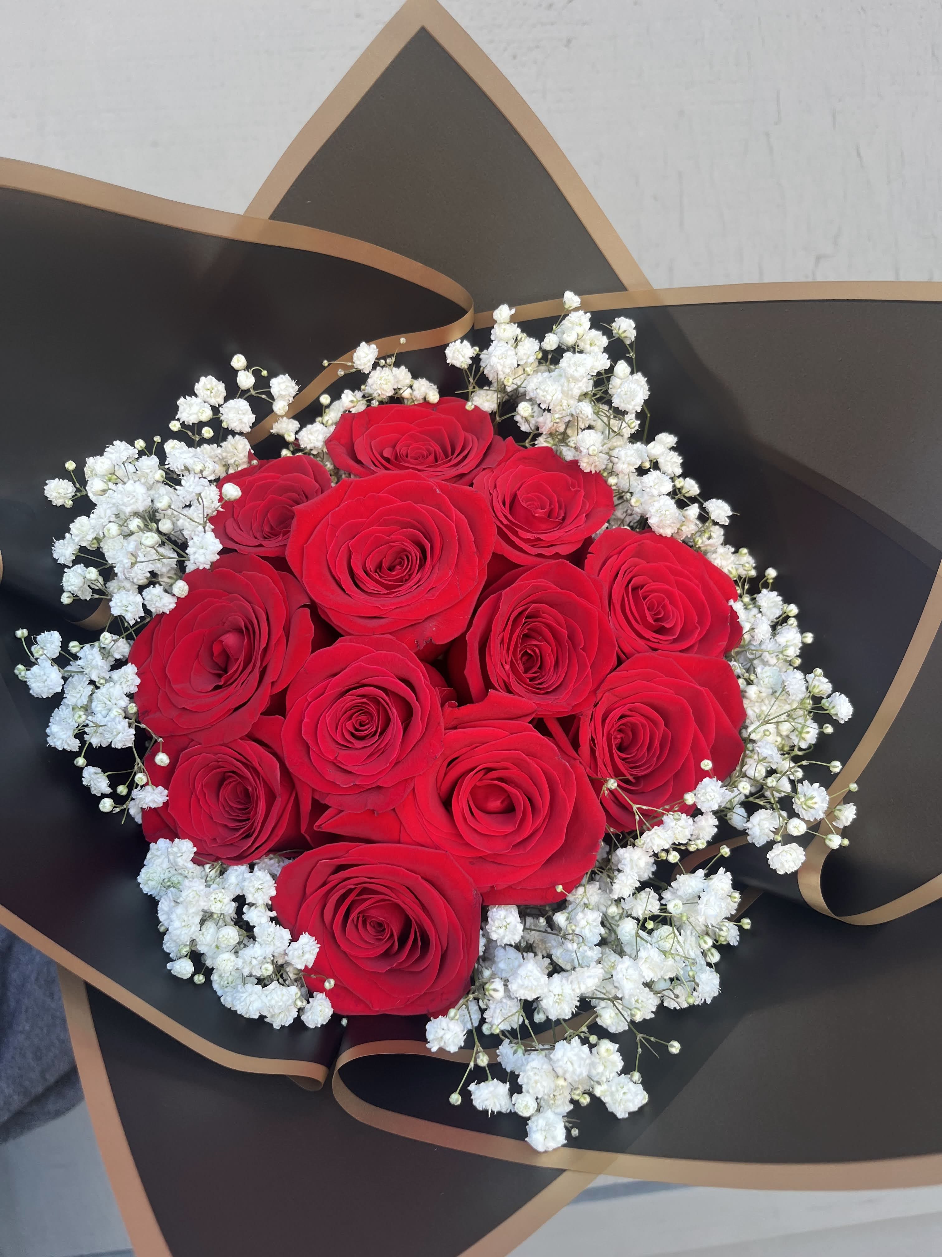 Valentine's Bouquet - A special red roses bouquet for Valentine's. Created with 12, 24 or 36 premium roses, wrapped in floral paper.