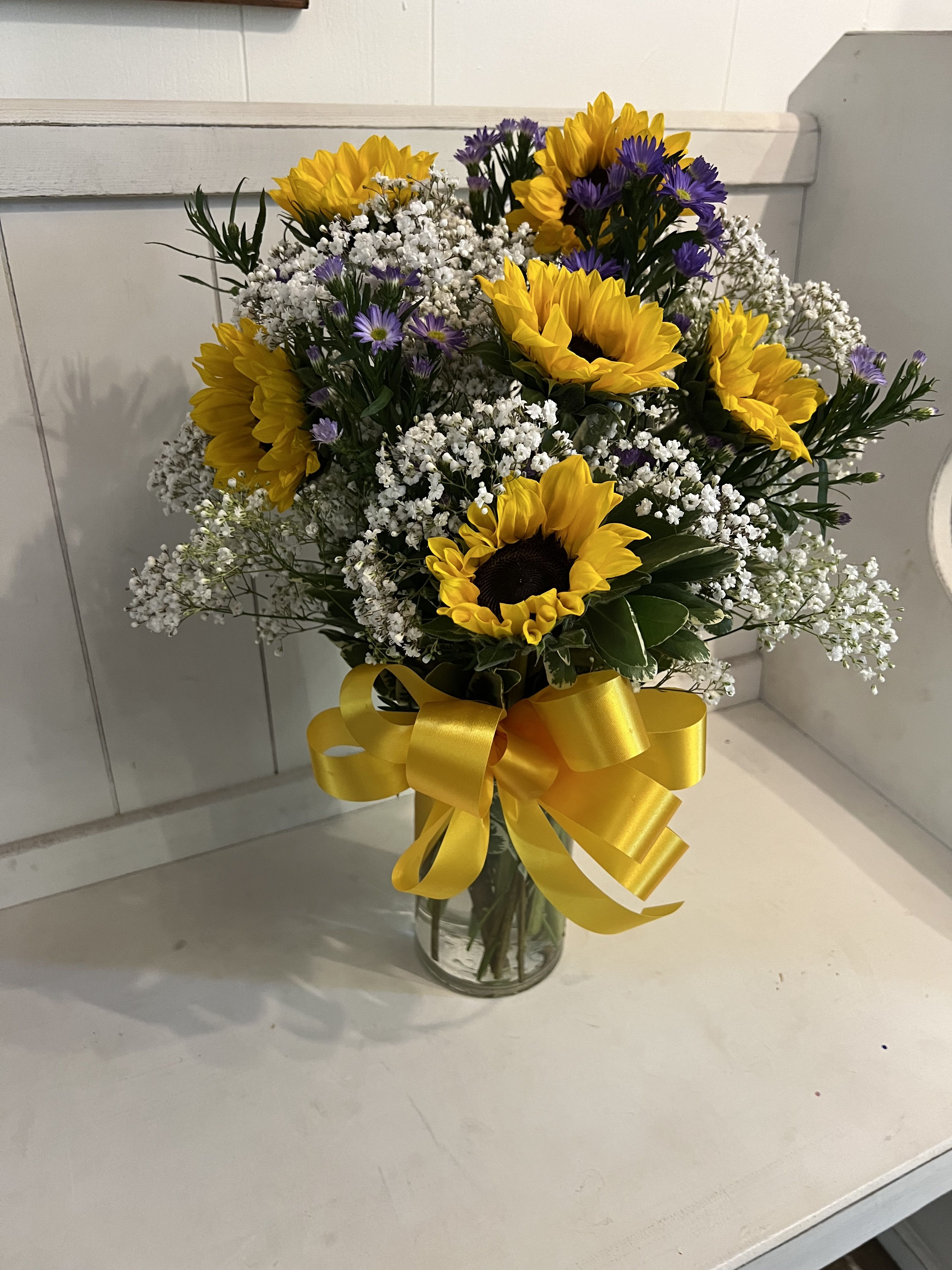 SUMMER SUN - 6 SUNFLOWERS WITH MISC FILLER IN A CLEAR VASE