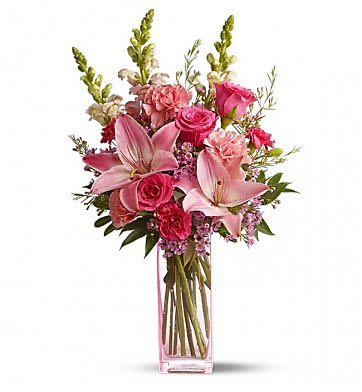 Pawleys Plantation Pawleys Plantation - White Lilies, pink roses, and greenery to finish it off. Perfect for Mother's Day, Valentines Day, or any occasion. Containers will vary.
