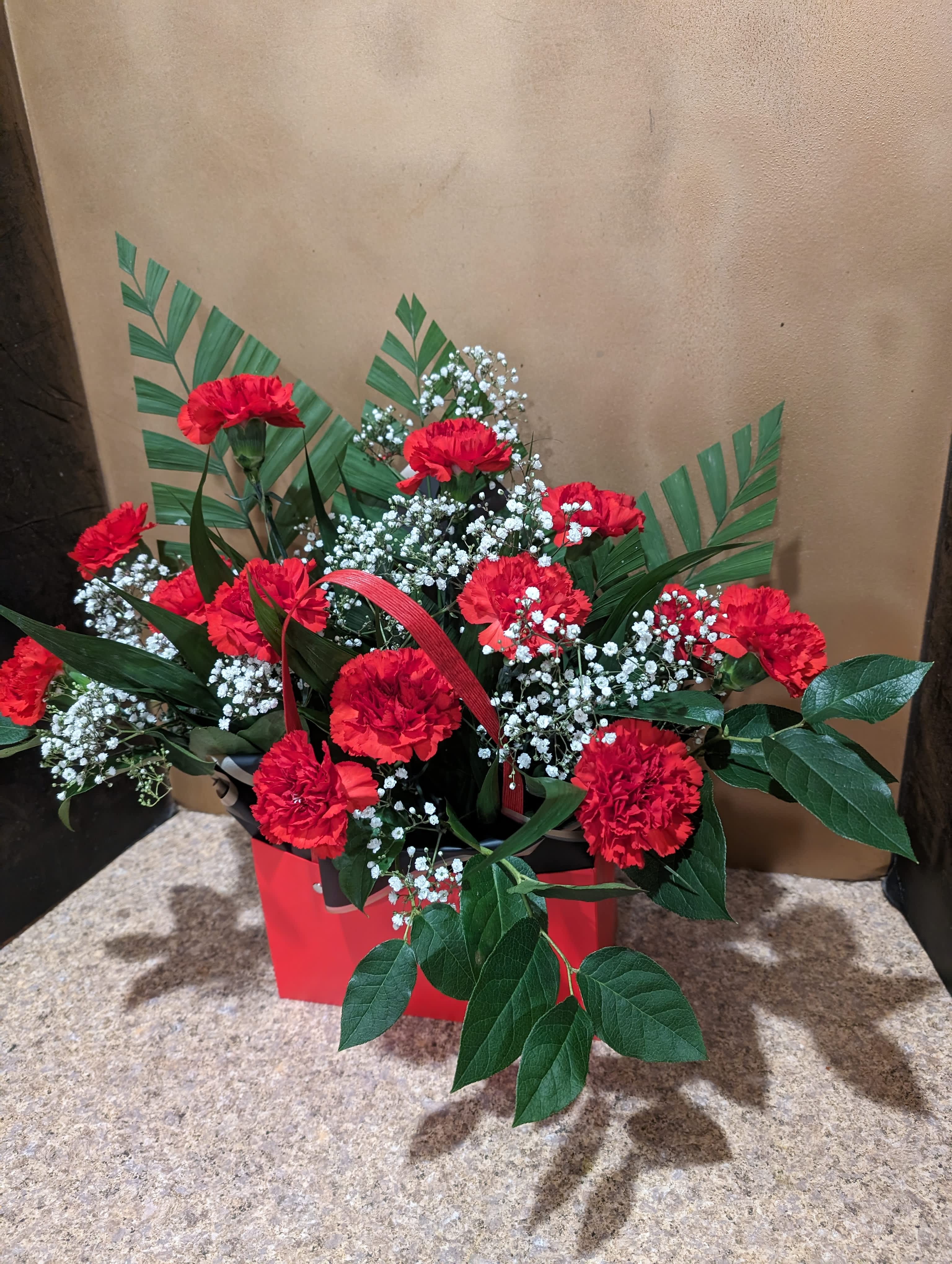 Radiant  - We are happy to offer  a beautiful arrangement with fresh, hand-picked flowers. Your one-of-a-kind gift will be impossible not to love. Send yours today.  Substitutions of flowers or containers happen due to weather, seasonality and market conditions which may affect availability. If this is the case with the gift you've selected, we will ensure that the style, theme and color scheme of your arrangement is preserved and will only substitute items of equal or higher value.