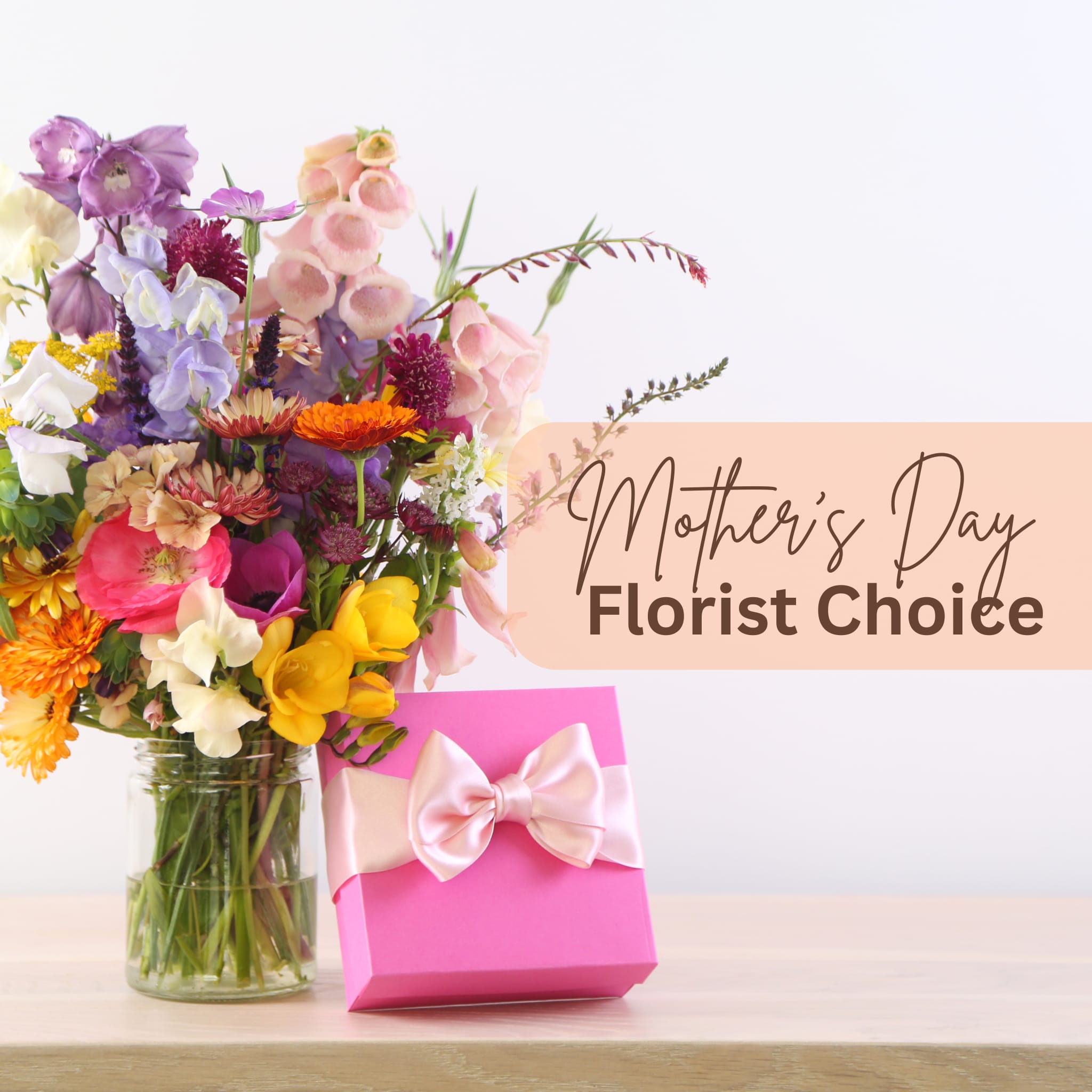 Mother's Day Florist Choice - Celebrate Mom with a stunning Florist's Choice Floral Arrangement, thoughtfully designed using the freshest seasonal blooms. Each bouquet is a unique creation, hand-selected by our expert florists to express love, gratitude, and beauty—just like Mom. Perfect for making her day truly special.