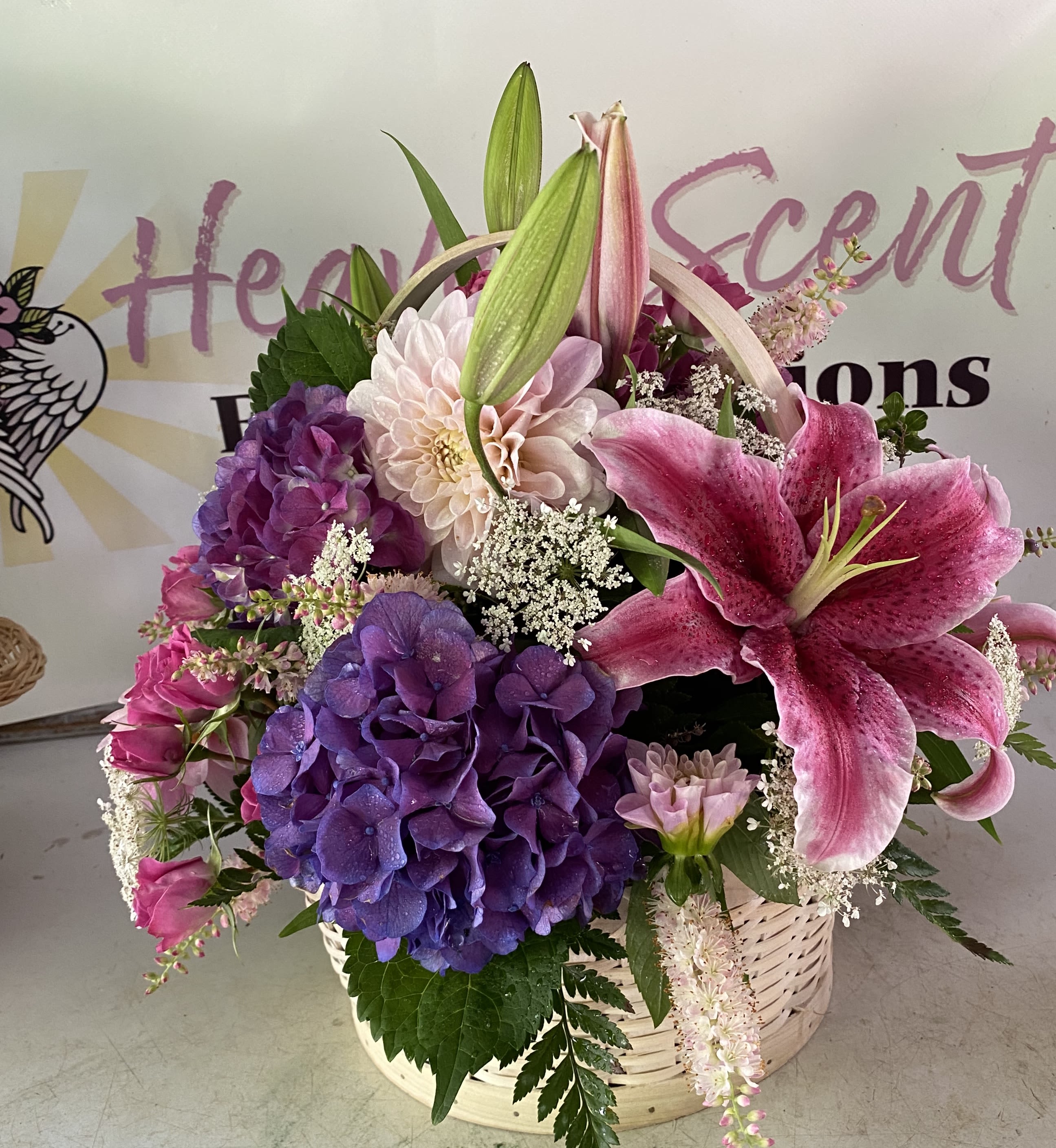 A Summer Special by Heaven Scent A Summer Special by Heaven Scent - Big, Bright beautiful blooms in a white basket