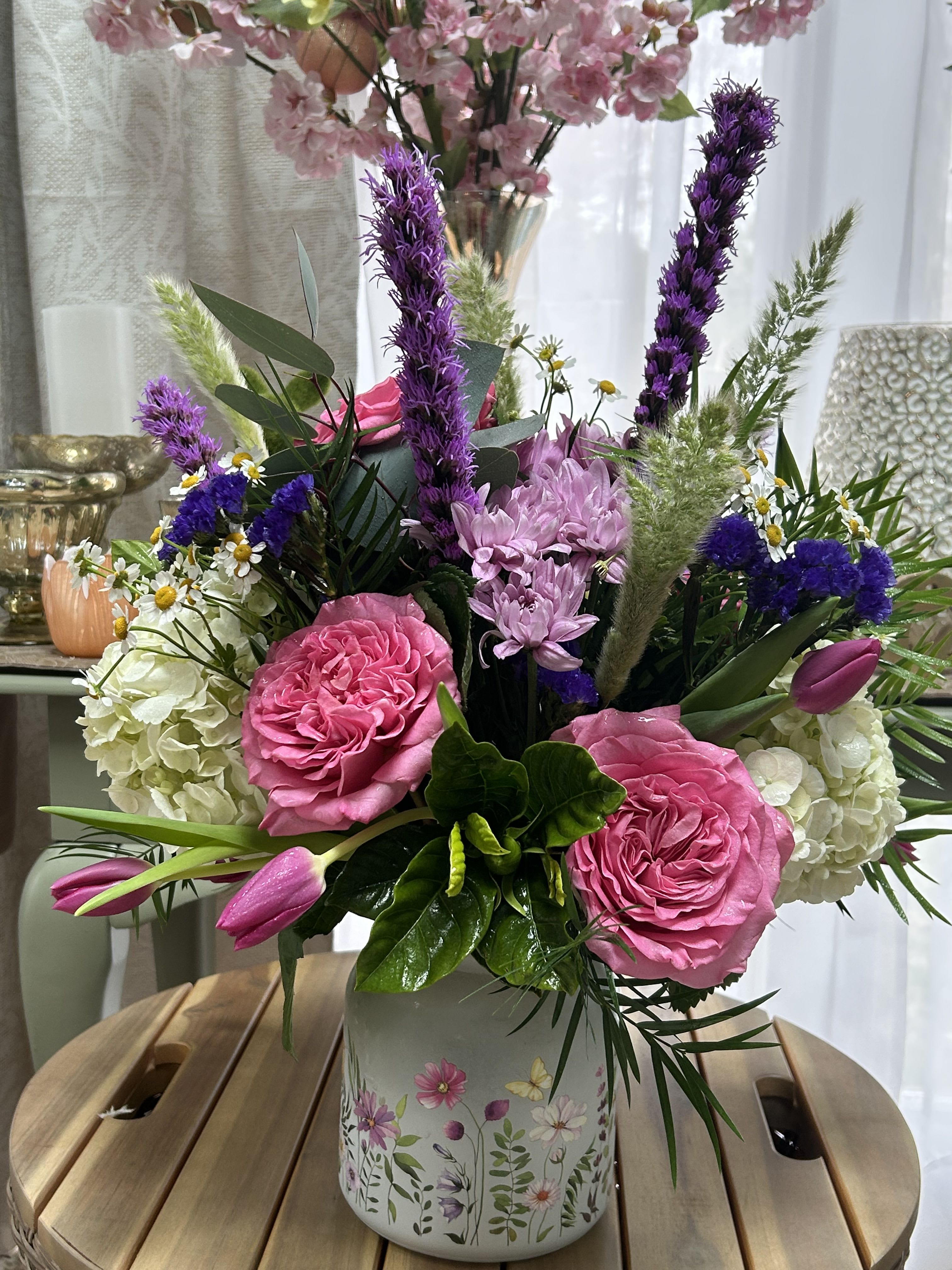 Wild about you Wild about you - Liatris, cottage roses, status, tulips, fever few, daisies, in a beautiful frosted wild flower vase