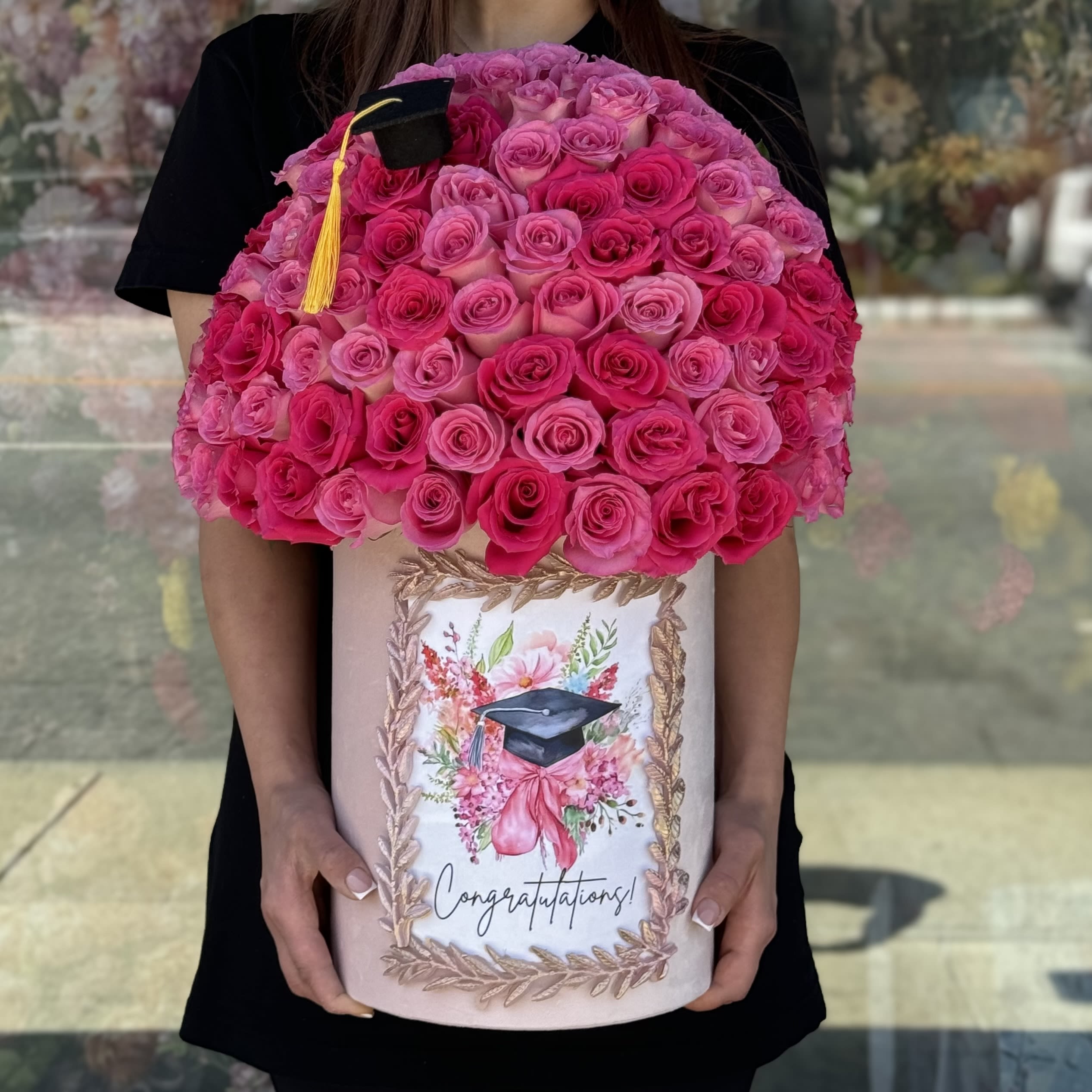 Graduation Bloom Graduation Bloom - A luxurious arrangement of 75 fresh roses—an embodiment of elegance and refined style. This exquisite bouquet is perfect for special occasions, whether it’s an anniversary, a milestone celebration, or a declaration of love. The grandeur of each rose emphasizes the significance of the gesture, creating an atmosphere of luxury and tenderness. Presented in a stylish box, it is a gift that will be remembered forever