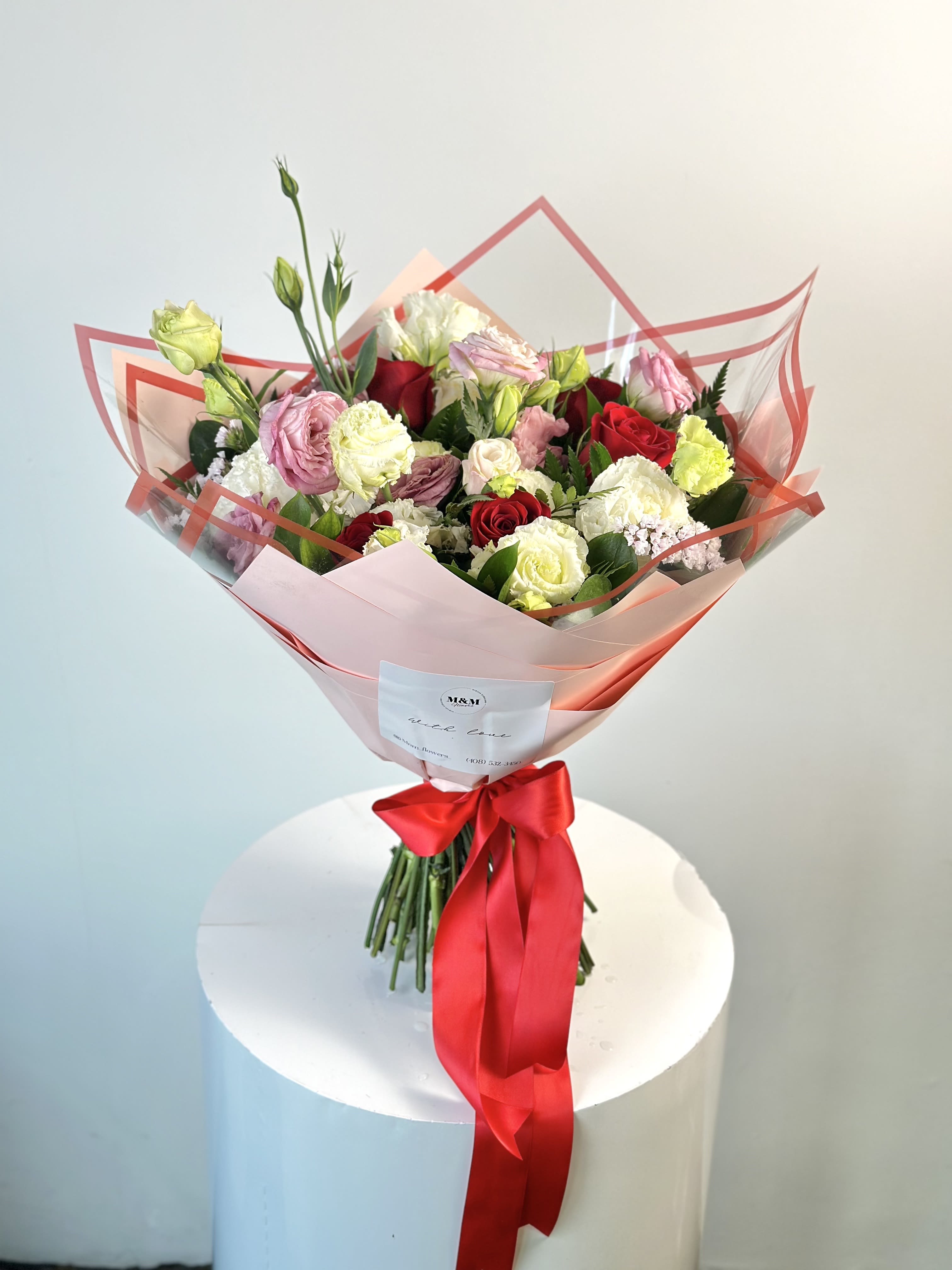 Be Mine  - Valentine's Collection  Dreamy flower bouquet! Celebration of love. Combines red, pink and white blooms, with extra special touch of modern water-proof wrapping papers. The perfect way to express your love on Valentine's Day.  Arrangement includes: - Fresh flowers - Wrapping papers - Flower care instructions card - Greeting card