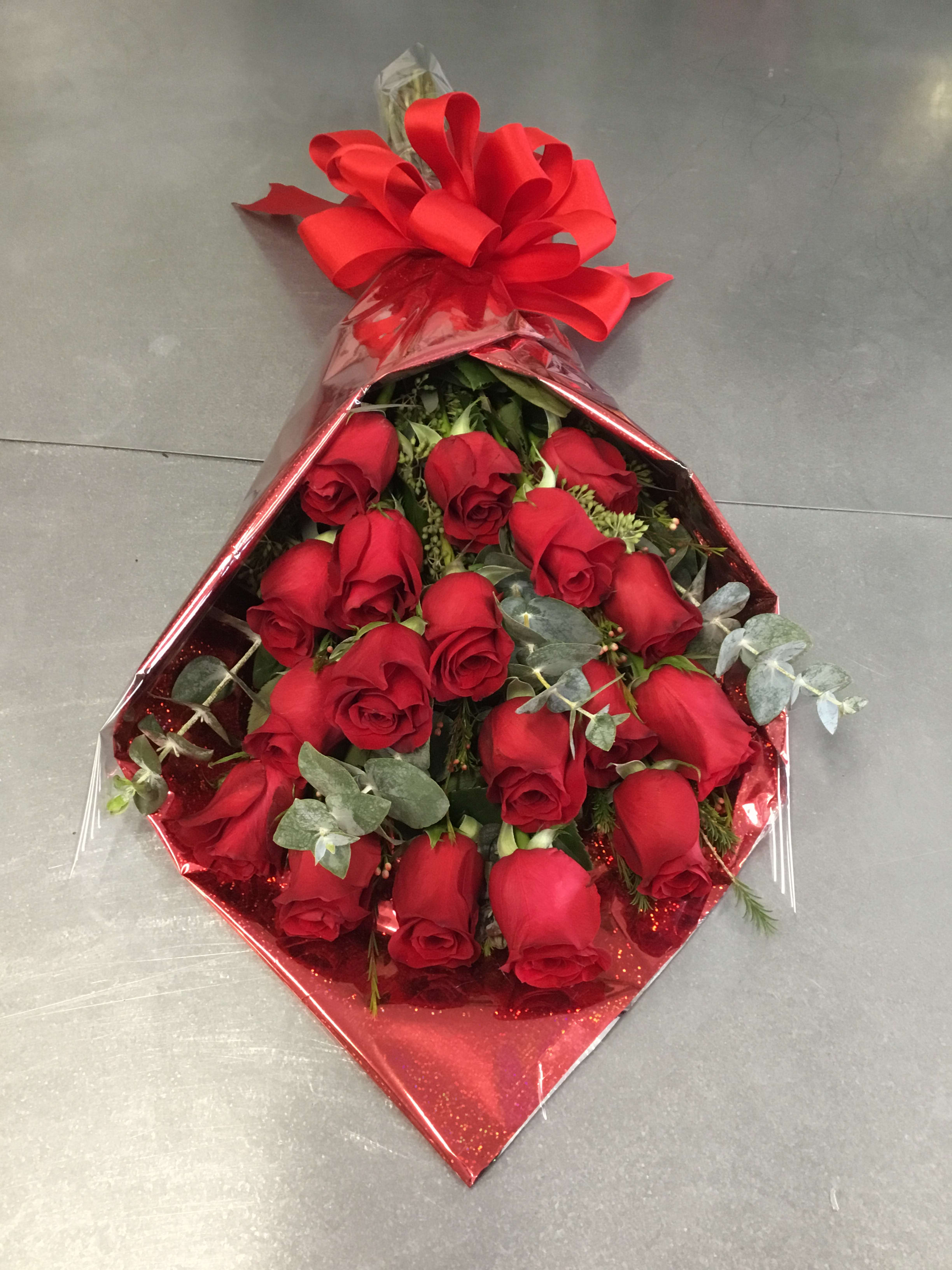 Cash and Carry Dozen Cash and Carry Dozen - Beautiful assortment of fresh bloom Roses beautifully wrapped.