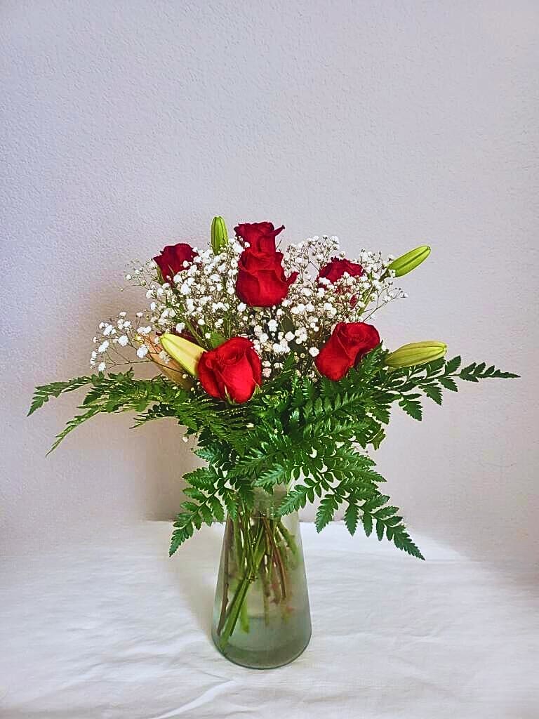 Roses &amp; Lilies - A simple yet sweet combination of roses, lilies, baby’s-breath, and greenery.