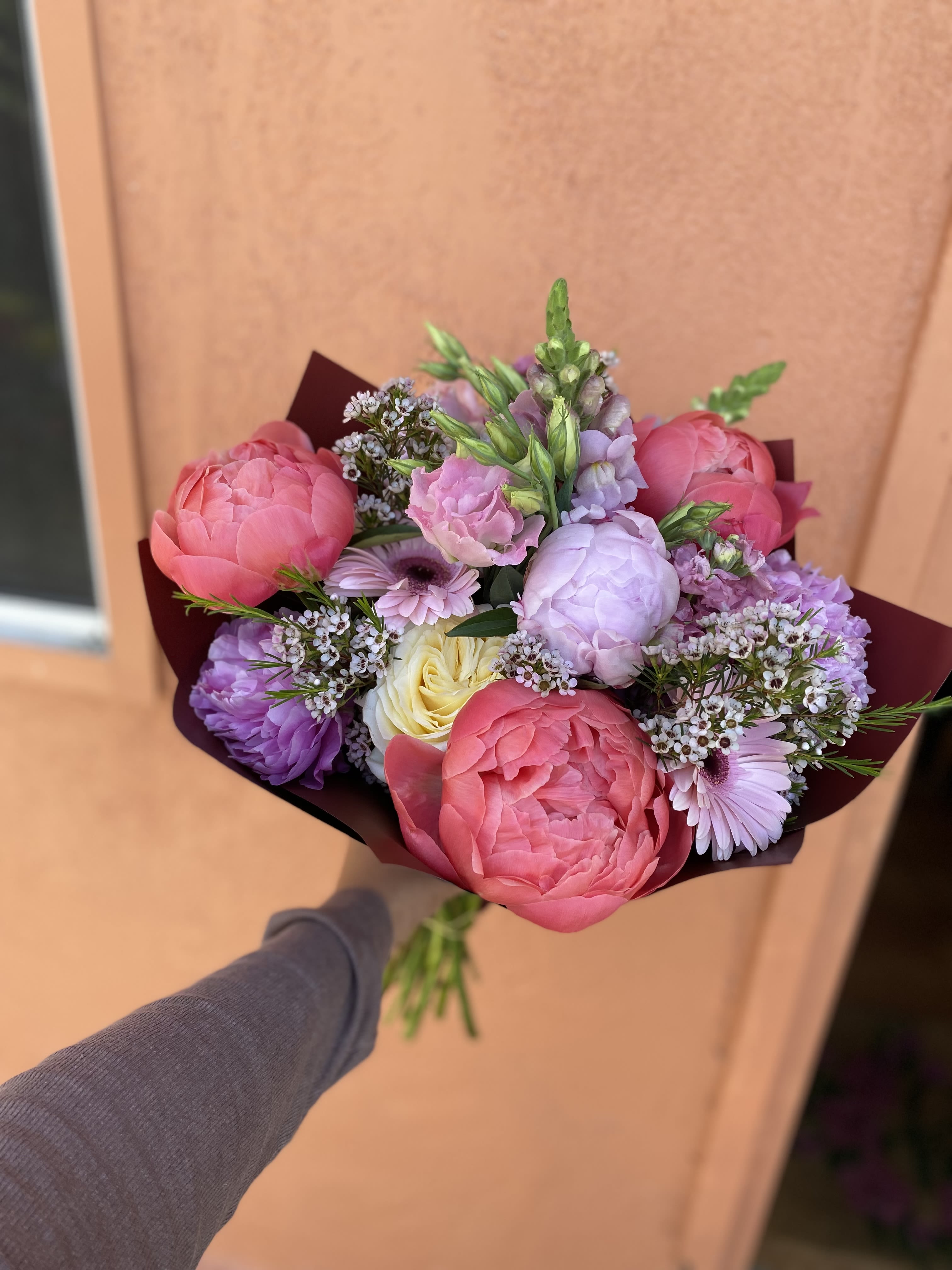 Maxi  - Stunning bouquet of mixed color peonies, snap dragon, roses and much more. Hand wrapped bouquet  Please note: color of peonies &amp; other flowers will vary