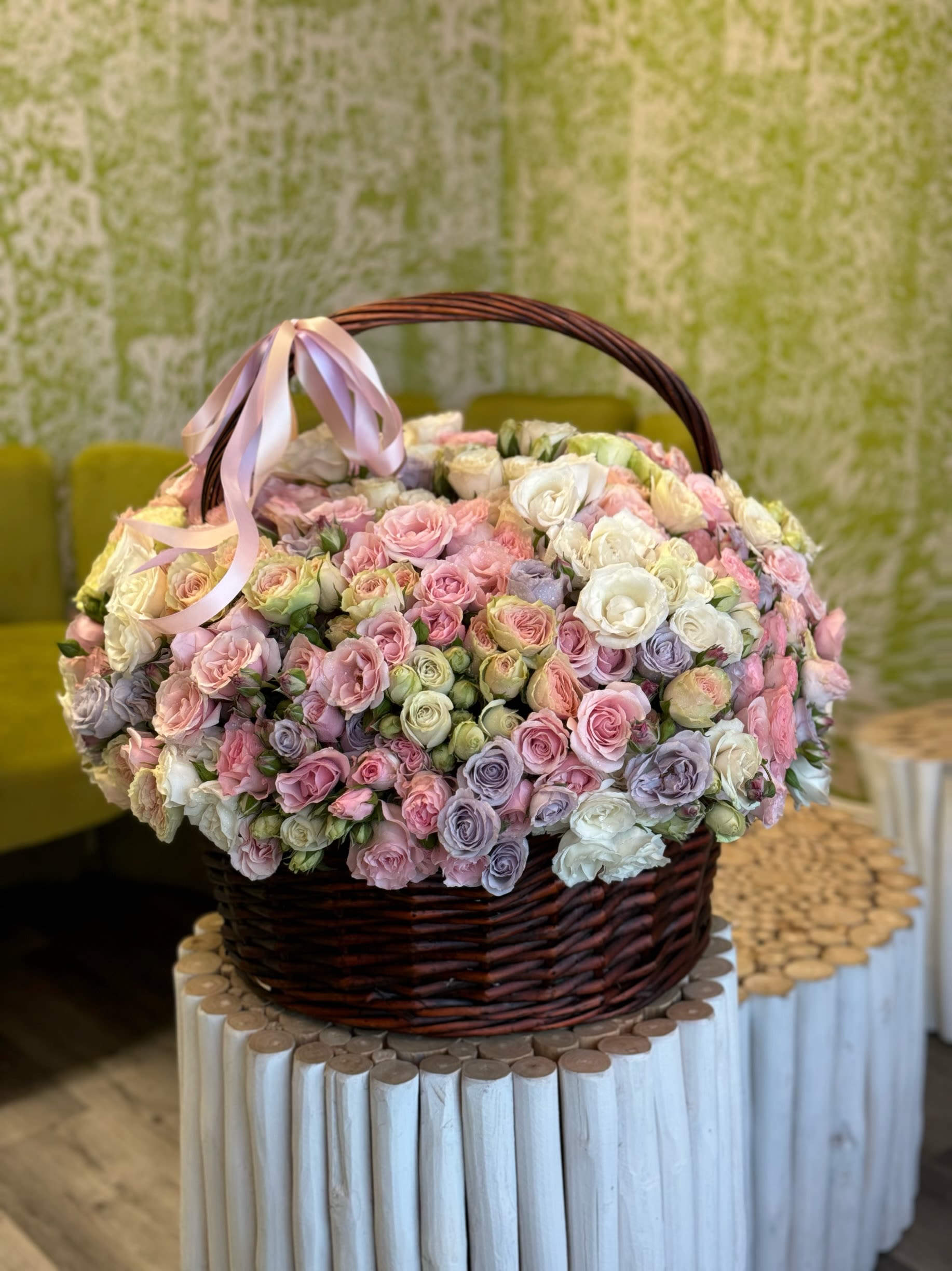 Basket of Garden Roses Basket of Garden Roses - Overflowing with pastel roses in pink, lavender, white, and blush tones, this large basket is the ultimate expression of love and gratitude for Mom.