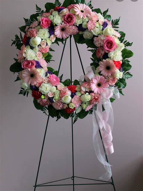 Cherished Memorys - This is a beautiful wreath that stands as a testament to the circle of life that must be acknowledged even in our saddest of moments. It will surely be appreciated by all in attendance.