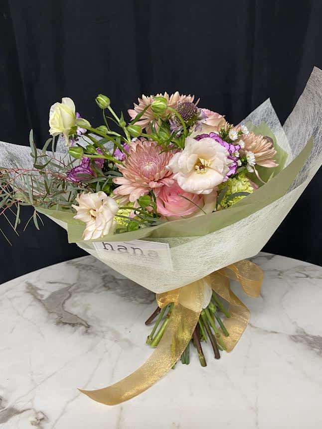 Thinking of you / Wrapped bouquet ( design of the day) - The designer will select only the best flowers of the day to create arrangement or bouquet inspired by the seasonal beauty of the flowers.  PLEASE NOTE: The flower selection in the picture is for the design sample and to represent the sizes. The selection of the the flower and color schemes will vary due to seasonal availability.