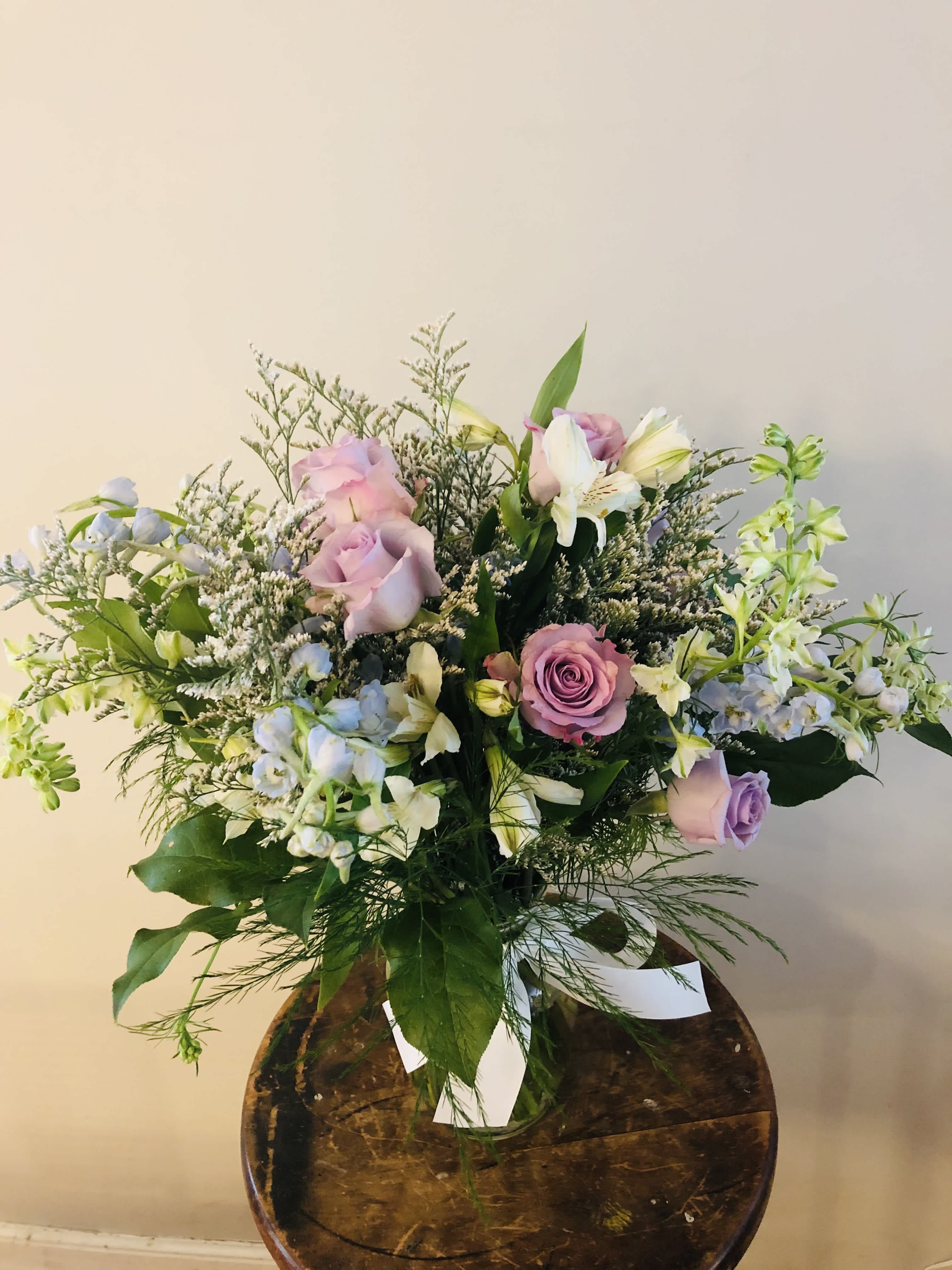 Dream / Wrapped bouquet (Design of the Day)  - The designer will select only the best flowers of the day to create arrangement or bouquet inspired by the seasonal beauty of the flowers.  PLEASE NOTE: The flower selection in the picture is for the design sample and to represent the sizes. The selection of the the flower and color schemes will vary due to seasonal availability.