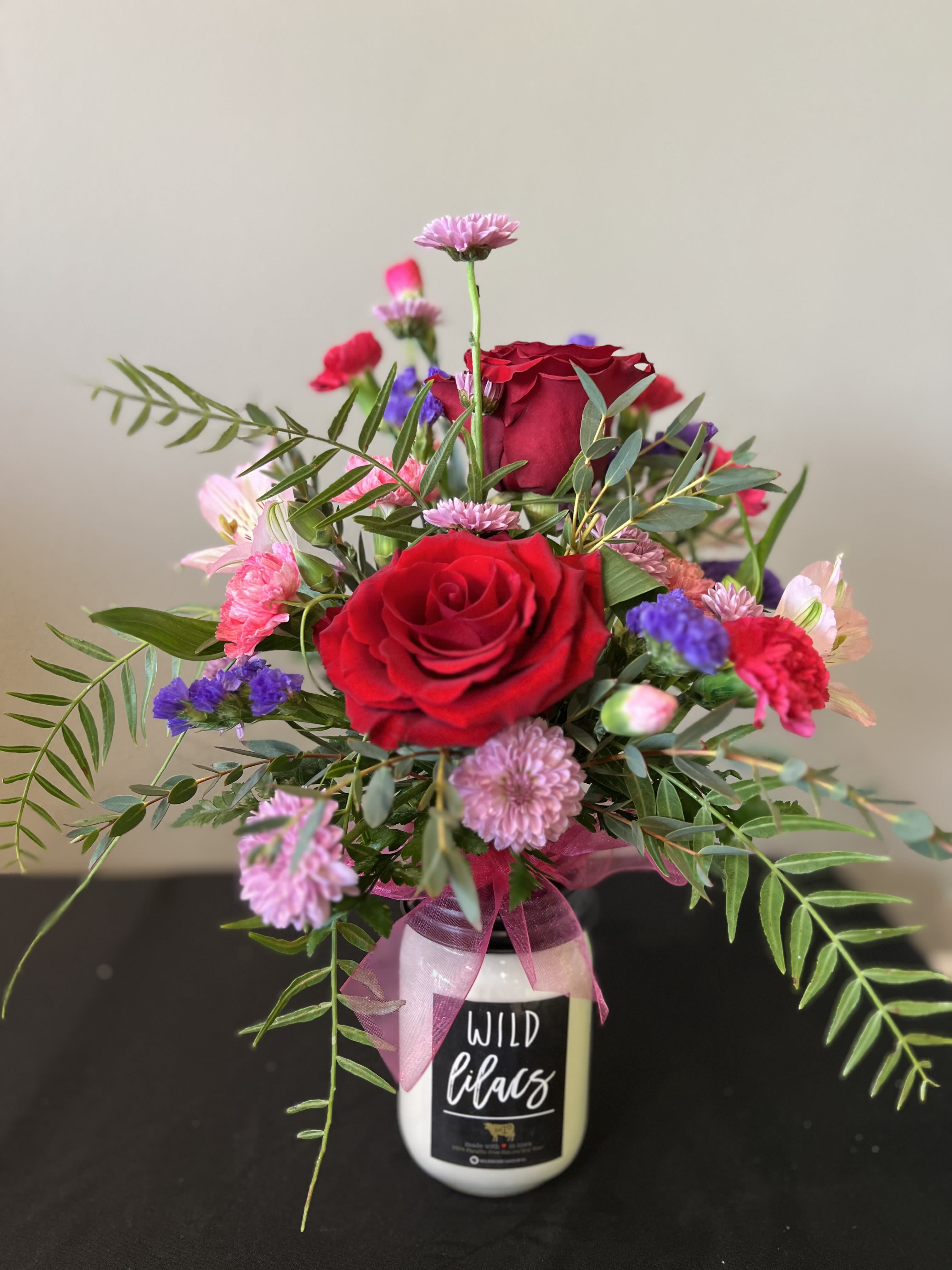 FRAGRANT AND BEAUTY (Arrangement ON TOP of Candle) - A unique arrangement, placed on top of a candle! The perfect two in one gift!  *Flowers Are Subject To Change Based On Supply*