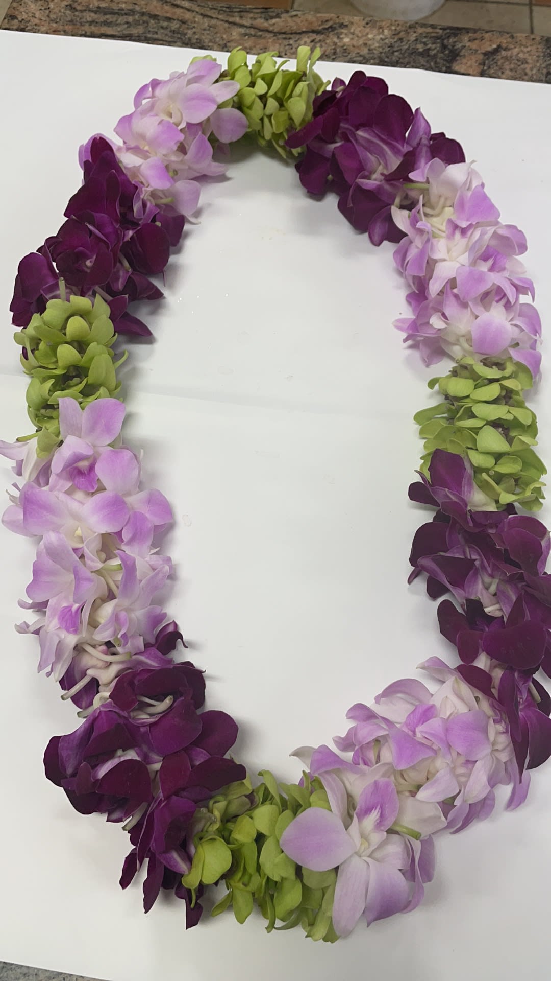 Lei 9 Lei 9 - This Lei make with purple pink and green dendrobium orchids.