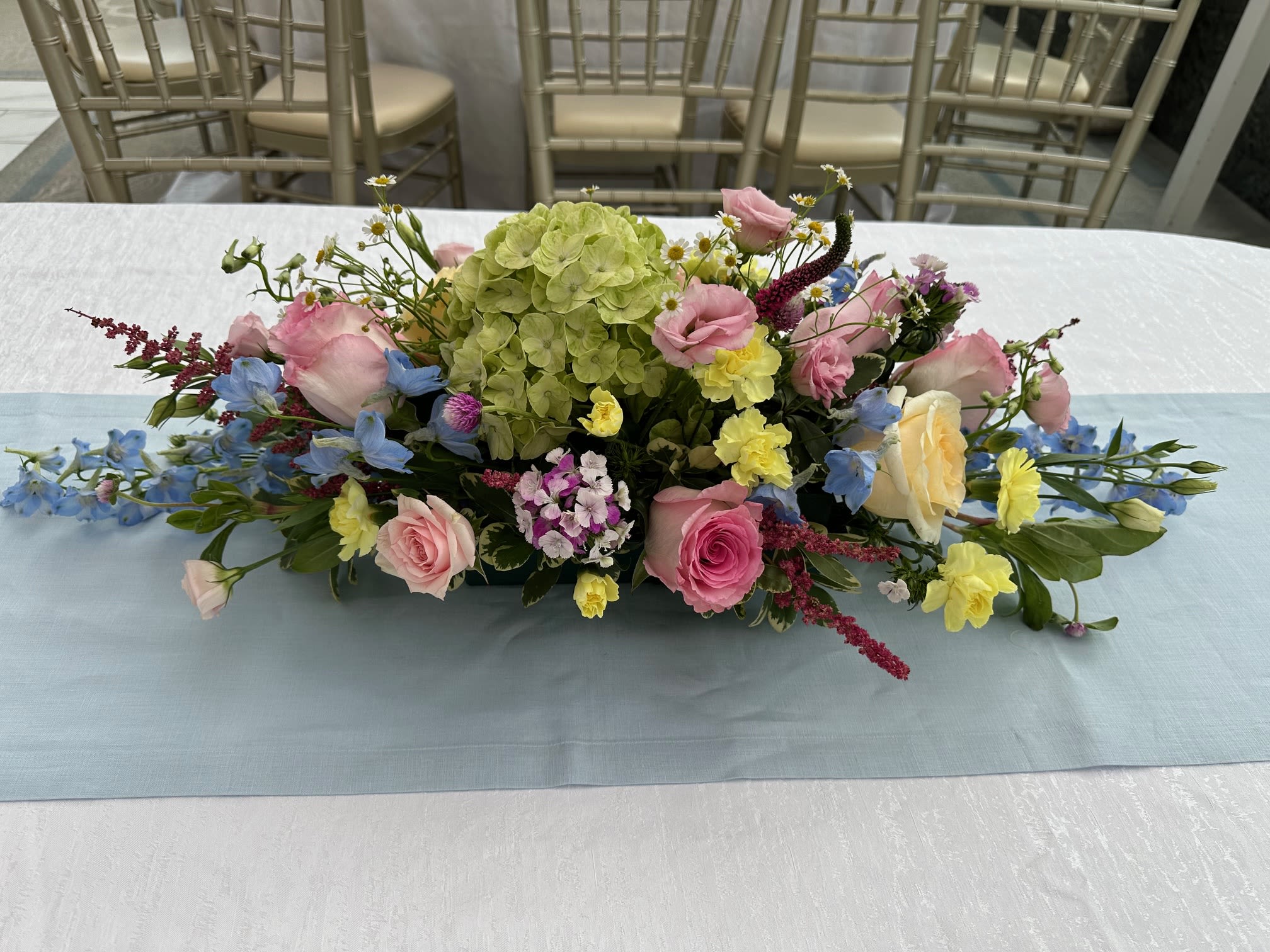 Bloom Garden Centeriece - Assorted  Hydrangea, Roses,  Cremons,  Lisianthus,  Assorted Seasonal  Flowers,  Hypericum, Fancy Greens.  These are examples of our designer's ideas.   Call  908-234-2900  to order these or   your ideas for your event.
