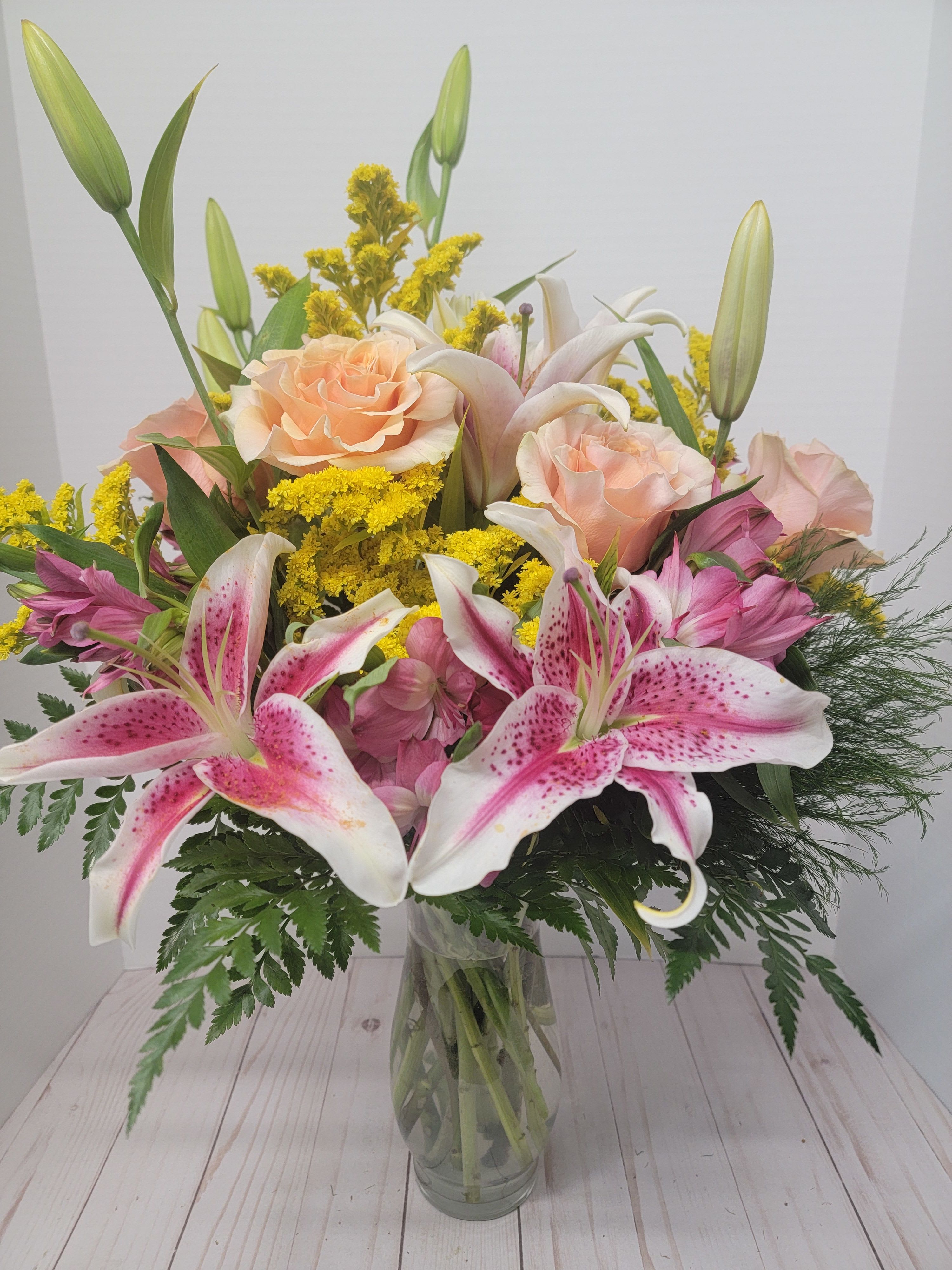 The Birthday Girl The Birthday Girl - A elegant and bright arrangement to celebrate your love one.